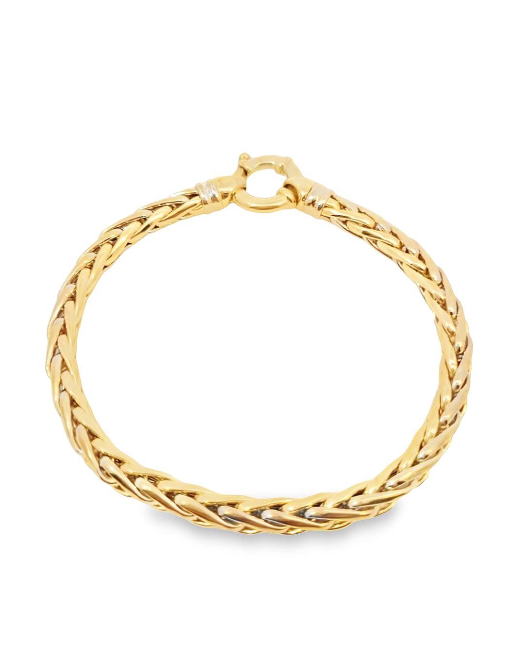 Deze armband van Louis Bros is vervaardigd uit 14 karaat bicolor (15.33 gr.). De armband heeft een dikte schakel van 5.45 mm. Deze armband is stijlvol, eenvoudig en gemakkelijk te combineren. De sieraden vormen enerzijds een prachtige basis voor een minimalistische look, of kunnen anderzijds uitgebreid worden met verschillende type sieraden voor een rijke en of een feestelijke uitstraling.
