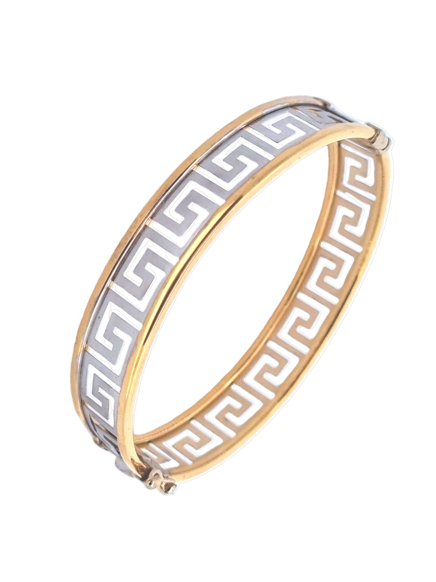  Deze armband van Louis Bros is vervaardigd uit 14 karaat bicolor (16.30 gr.). De armband heeft een breedte van 12.50 mm en een dikte 2 mm.

Deze armband in Griekse stijl is een verfijnd en elegant sieraad dat twee verschillende kleuren combineert, zoals goud en zilver, om een intrigerend contrast te creëren. Geïnspireerd door de klassieke Griekse ontwerpen, bevat deze armband vaak ingewikkelde patronen zoals meanders, golven of motieven van laurierbladeren, die symbool staan voor eeuwigheid en overwinning. Deze armbanden stralen niet alleen een tijdloze schoonheid uit, maar dragen ook een rijke culturele betekenis, wat ze tot een perfect accessoire maakt voor elke gelegenheid. Door de combinatie van twee kleuren met klassieke elementen, biedt deze armband een stijlvolle en veelzijdige toevoeging aan elke sieradencollectie.
