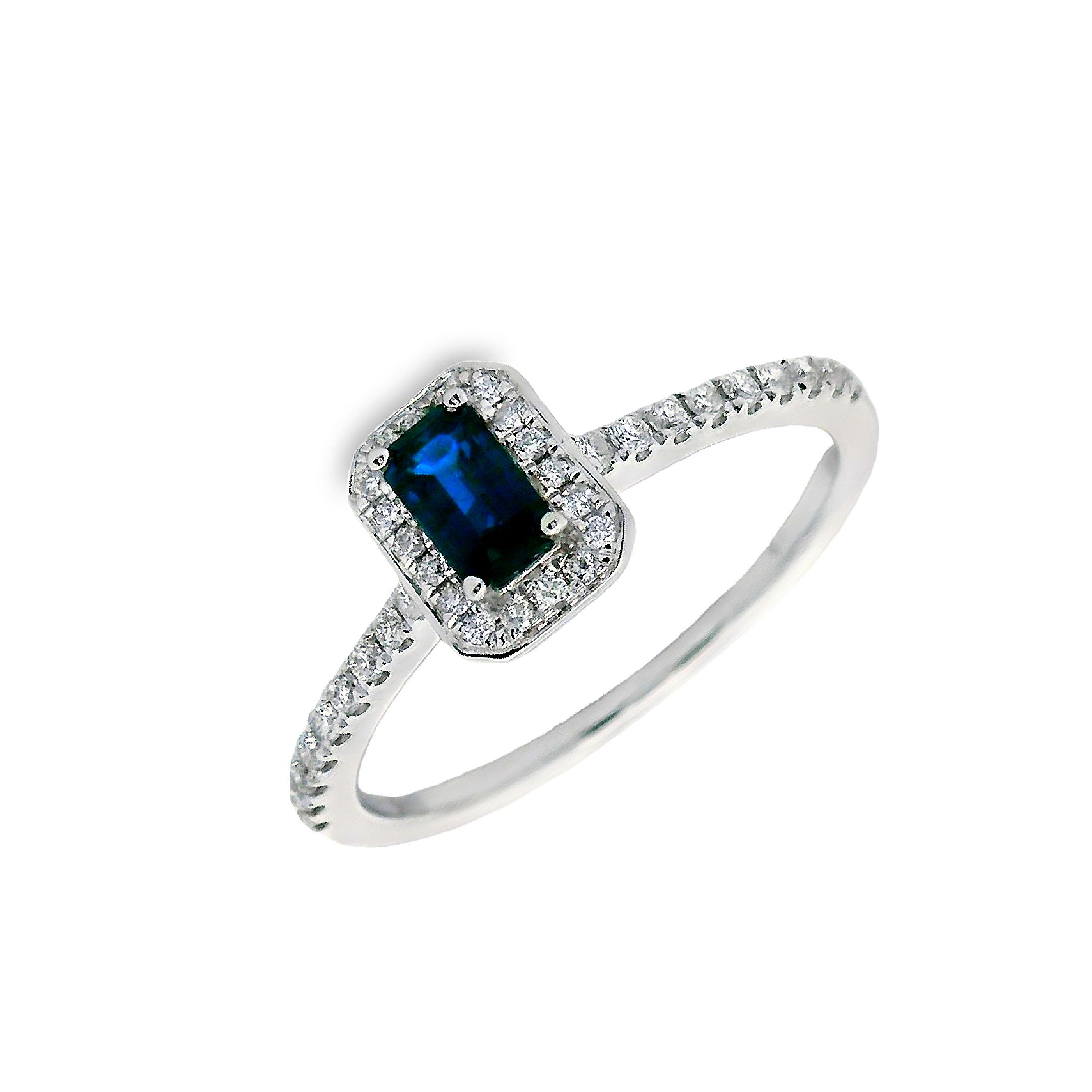 Deze ring van Louis Bros is vervaardigd uit 14 karaat witgoud (2 gr.) en is gezet met 36 briljant geslepen diamanten met een totaalgewicht van 0.20ct en 1 saffier 0.41ct. De ring heeft een diameter van 7.5 mm, minimale breedte van 1.5 mm. en een hoogte van 5.5 mm. In het hart van deze betoverende witgouden ring schittert een majestueuze blauwe saffier als een fonkelende ster aan de nachtelijke hemel. Met zijn diepe, serene kleur straalt de saffier rust en harmonie uit, terwijl het een gevoel van mysterie en verfijning oproept. Deze ring is niet alleen een symbool van tijdloze schoonheid en elegantie, maar ook van liefde en verbondenheid. Het is een belofte van eeuwige liefde en een herinnering aan de kostbaarheid van elk moment samen. Met zijn verfijnde design en schitterende edelstenen is deze witgouden ring met een blauwe saffier en diamanten een waar kunstwerk dat de ziel betovert en de harten van anderen steelt.
De ring is verkrijgbaar in meerdere afmetingen.