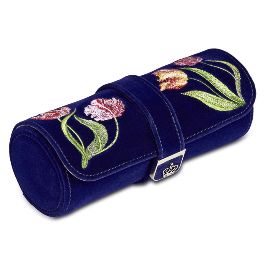 Deep blue velvet Double Watch Roll with elaborate tulip embroidery exterior, includes small velvet embroidered jewellery zip case and space for 2 watches with WOLF’s patented Watch Guard. Organise your watches and jewellery in style. Includes LusterLoc™ anti-tarnish lining and silver finish closure and details.