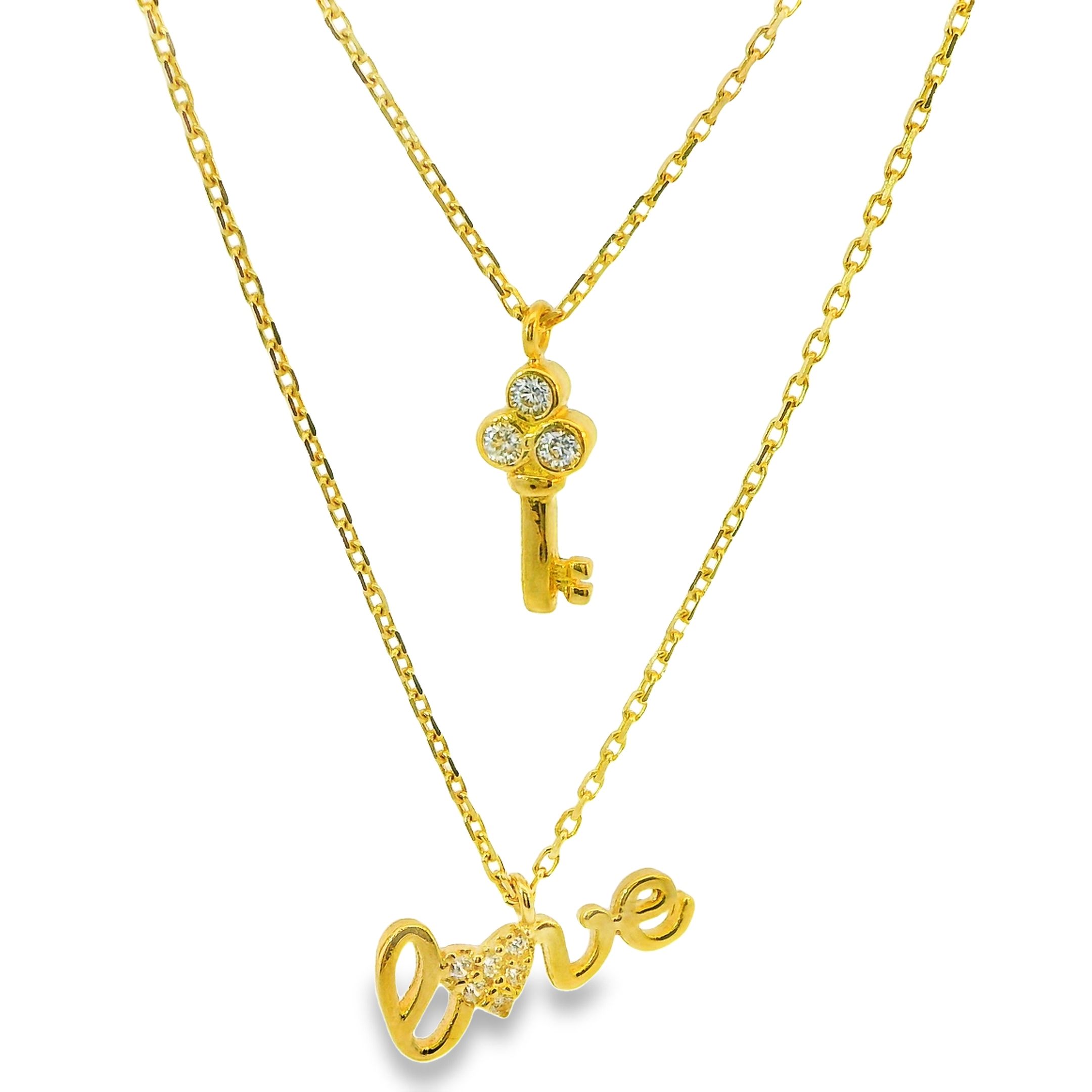 Deze ketting van Louis Bros is vervaardigd uit 14karaat geelgoud met hartjes en love (2.79 gr).  Deze ketting kun je dragen op 40, 42 en 45 cm. 
Laat liefde en elegantie samensmelten met deze prachtige double ketting in geelgoud, versierd met een betoverend "love" en hartontwerp. Deze ketting is niet alleen een sieraad, maar een symbool van verbondenheid en emotie, ontworpen om de liefde te vieren en te koesteren.
Het geelgoud, met zijn warme en uitnodigende gloed, omlijst de hals op een verfijnde manier en voegt een vleugje luxe toe aan elke look. Het is een tijdloos metaal dat staat voor liefde, geluk en voorspoed, en dat de drager een gevoel van kracht en vertrouwen geeft.
Het "love" en hartontwerp, subtiel en toch betekenisvol, straalt met een onmiskenbare charme. Het woord "love" is een krachtig symbool van genegenheid en verbondenheid, terwijl het hart staat voor liefde en emotie. Samen vormen ze een uitdrukking van pure en onvoorwaardelijke liefde.