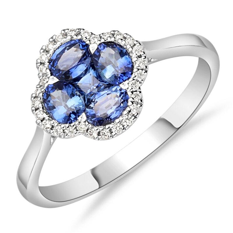 een 18 krt witgouden fantasie ring klaver met 5 blauwe saffiertje totaal 0.94 en daaromheen 28 diamant stenen briljant geslepen totaal 0.10 G/SI.