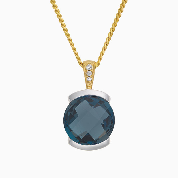 Eclat gouden hanger met london blue topaas en 0.02ct. diamant (excl. collier)