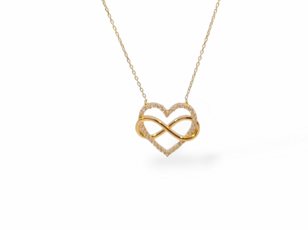  Deze hanger inclusief collier van Louis Bros is vervaardigd uit 14 karaat geelgoud (2.50 gr). Deze hanger infinity met zirkonia is prachtige hanger straalt tijdloze schoonheid uit en voegt een vleugje glamour toe aan elke outfit. De hanger is bezet met sprankelende zirkonia's en heeft een afmeting van(16x18mm) waardoor het een opvallend sieraad is dat zeker de aandacht zal trekken.