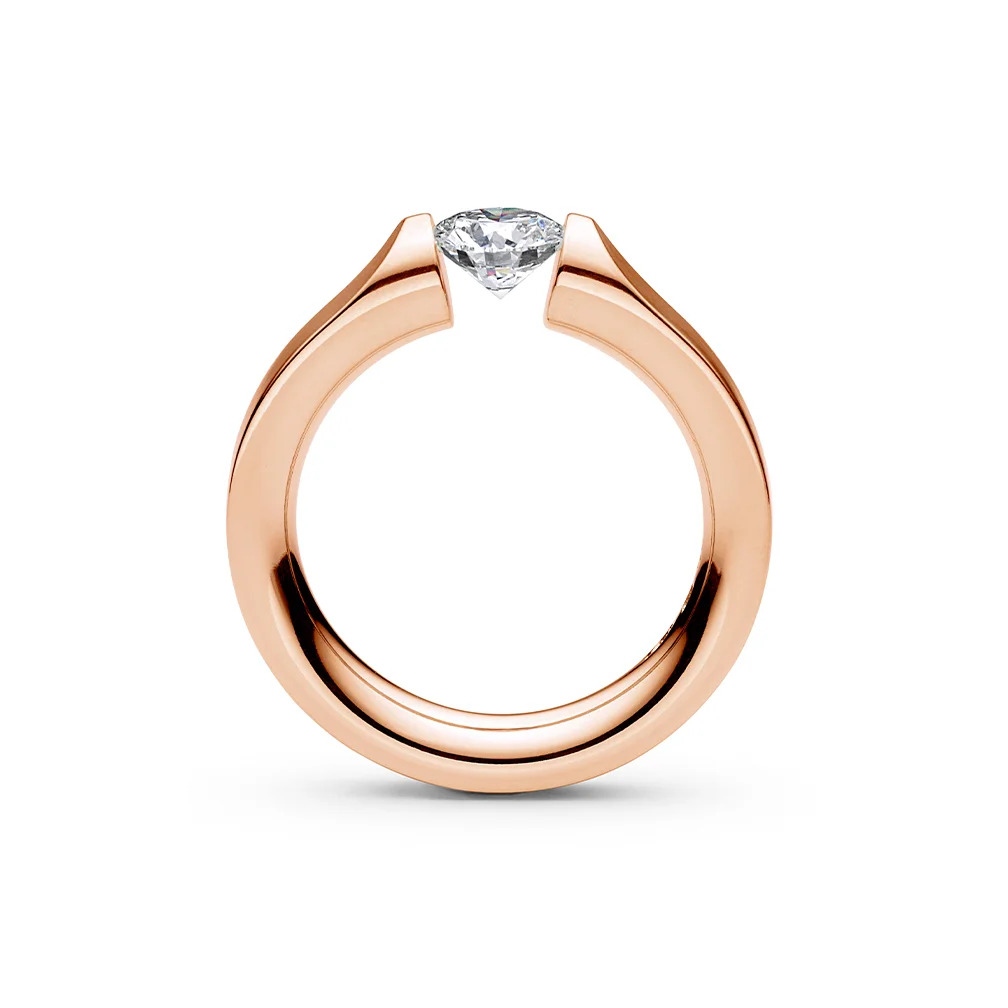 een 18 krt rose gouden Niessing spanring, model Everst met een diamant briljant geslepen 0.53 crt TW VS