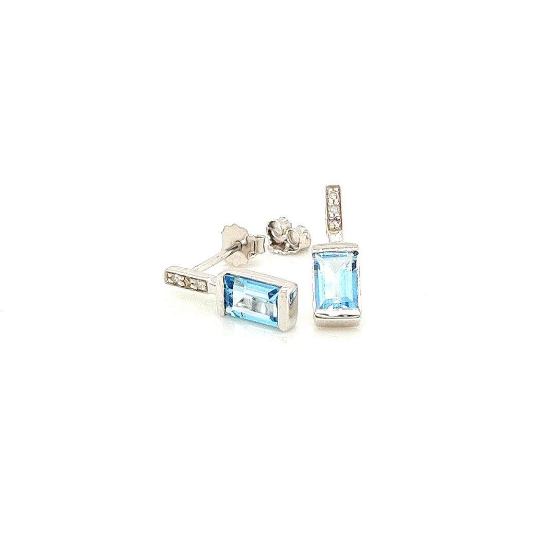 Witgouden oorknoppen met swiss. blue topaas en diamant WRSM