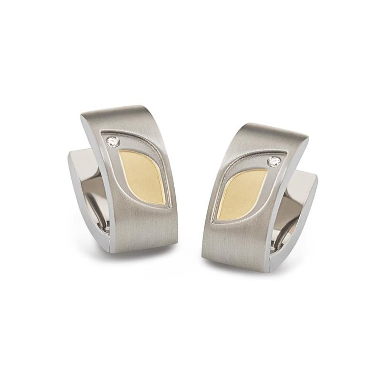 Diese Titancreolen bestechen durch ihr zeitloses Design. In Silber gehalten, geh&ouml;ren diese Schmuckst&uuml;cke zu den hochwertigsten Accessoires. Die eleganten Ohrringe erg&auml;nzen sowohl allt&auml;gliche als auch formelle Outfits perfekt. Tragen Sie sie zu einem schicken Abendkleid oder einem eleganten B&uuml;ro-Outfit f&uuml;r einen stilvollen Look.