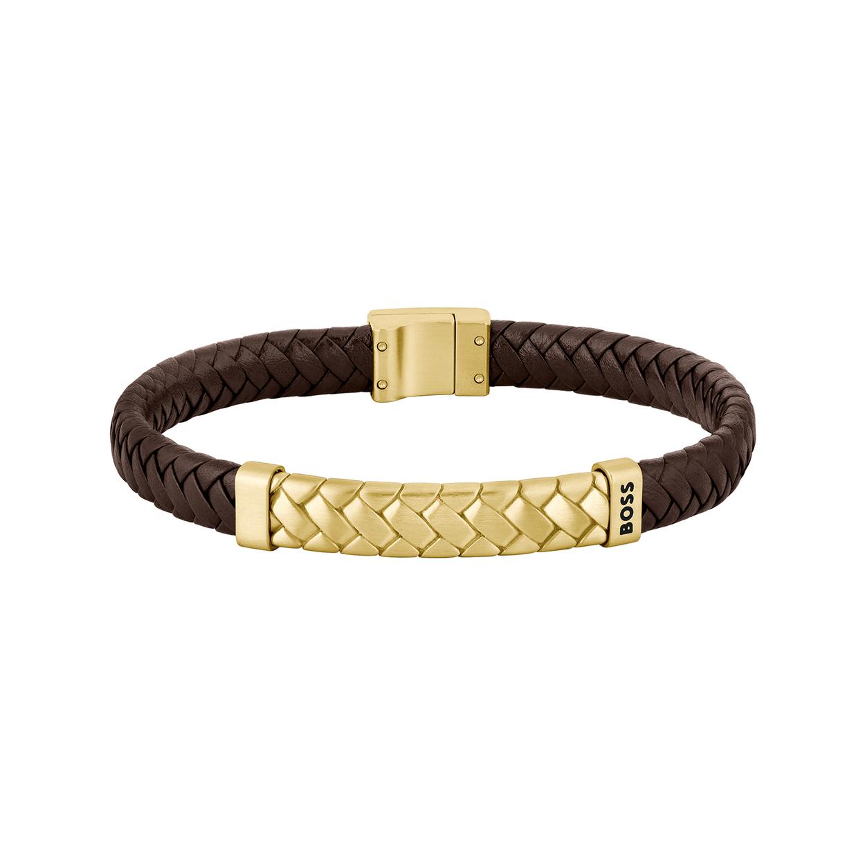 De Geel stalen lederen armband is een stijlvolle accessoire. Deze armband is een gouden kleurige, roestvrijstalen armband met een lengte van 190 mm. Perfect voor dagelijks gebruik of speciale gelegenheden. Draag hem om je pols als een opvallend modestatement, zowel solo als in combinatie met andere sieraden  of uurwerk voor een geslaagde look.