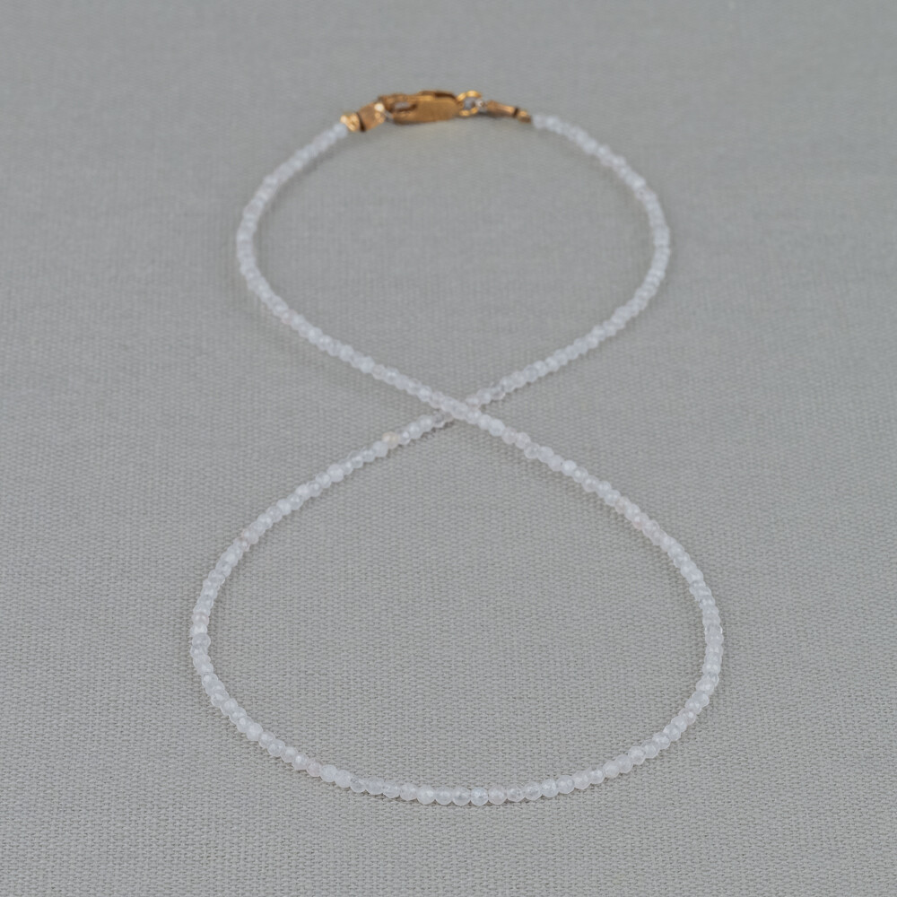 collier van bergkristal met verguld slotje