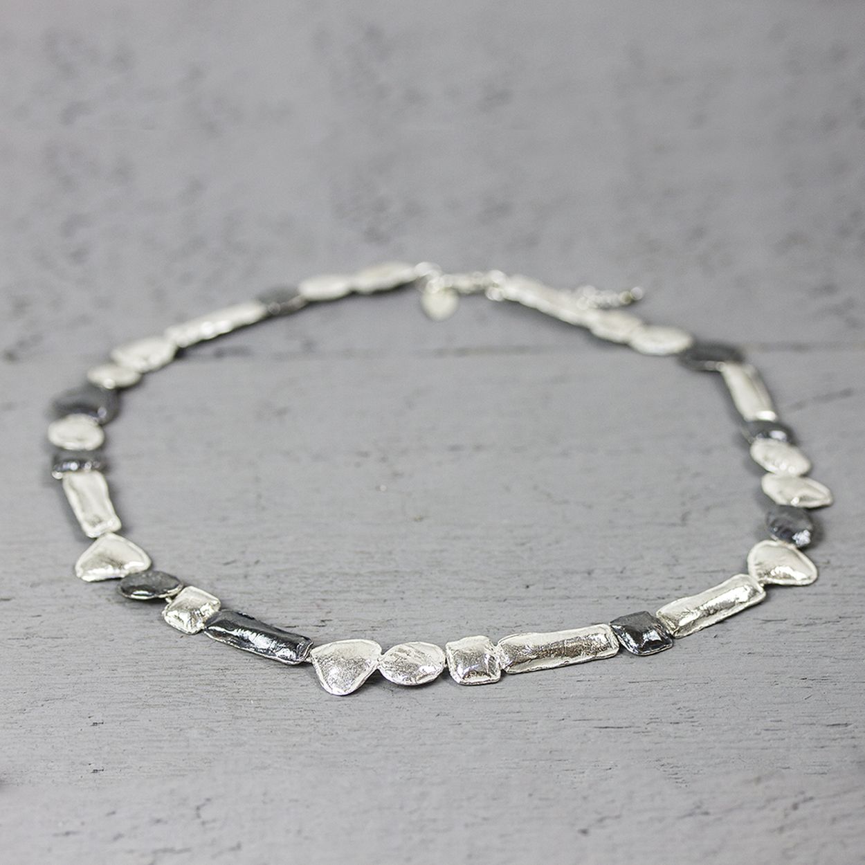 Collier figuren zilver wit en oxy