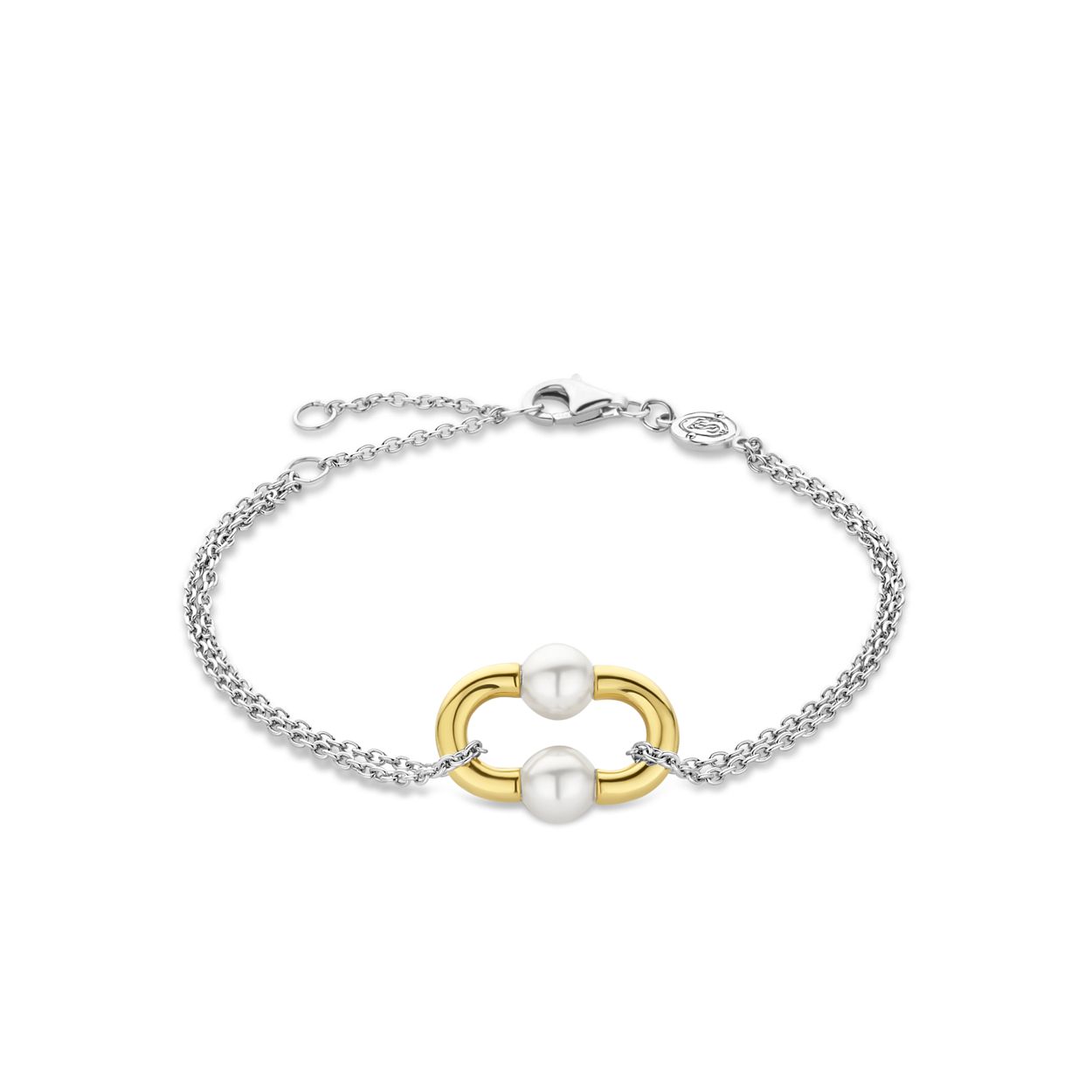 Deze TI SENTO vergulde schakelarmband 23014YP is verrijkt met onze kenmerkende vergulde schakel en twee witte parels die met de hand zijn gezet. Een stijlvol sieraad, hoe je het ook draagt. Gemaakt van de hoogste kwaliteit 925 sterling zilver, de schakel is verguld met geelgoud. Het contrast tussen het geelgoud en de glanzende witte parels geeft dit sieraad een buitengewoon luxueuze uitstraling. De lengte van de armband is verstelbaar zodat het perfect past. Al onze armbanden zijn nikkelvrij en hypoallergeen.

De armband heeft een standaardlengte van 16 cm en heeft een verlengstuk van 4 cm. Hierdoor kan je de armband op 3 verschillende lengtematen dragen, op 16 cm, 18 cm en 20 cm.