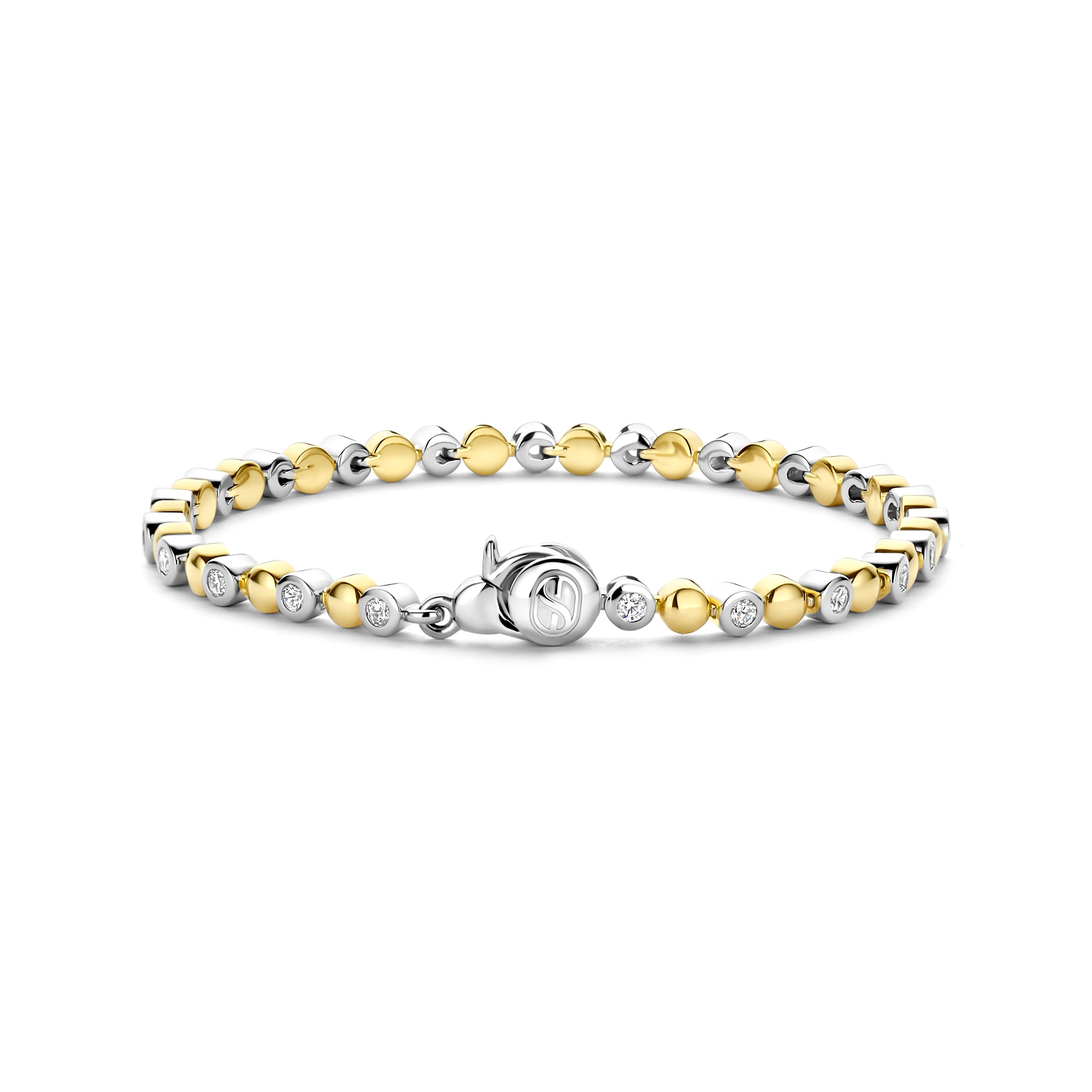 Omarm de warmte van de zomer met de TI SENTO armband 23066ZY, een moderne interpretatie van tijdloos design. Vervaardigd uit 925 sterling zilver en verguld voor bescherming en langdurige glans, biedt deze prachtige armband een betoverend spel van goudkleurige halfbubbels, afgewisseld met sprankelende witte cubic zirconia gezet in zilveren zettingen. Het centrale punt is een gestileerd TI SENTO symbool, dat een vleugje ingetogen verfijning toevoegt aan dit charmante stuk. De warme gouden tinten roepen de gloed van een zomerse zonsondergang op, wat een armband cre�ert dat zowel elegant als moeiteloos chic is. Zorgvuldig vervaardigd voor de gevoelige huid, zorgt deze nikkelvrije en hypoallergene armband voor langdurig comfort en kwaliteit.