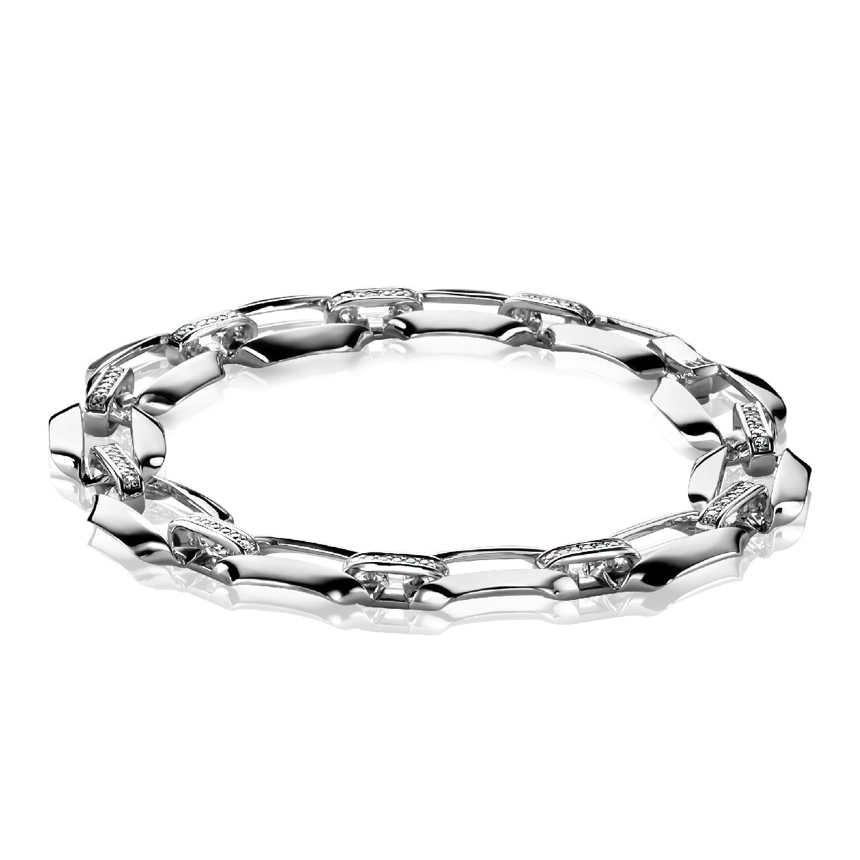 ZINZI zilveren schakelarmband exclusief ontworpen door Mart Visser. De grote zilveren fantasie schakels (11 x 15mm) worden met elkaar verbonden door een rechte verbindingschakel bezet met witte zirconia's. Deze armband draagt herkenbaar de signatuur van Mart Visser. Vervaardigd van eerste gehalte zilver (925) en met extra rodiumlaag voor een langdurige glans.