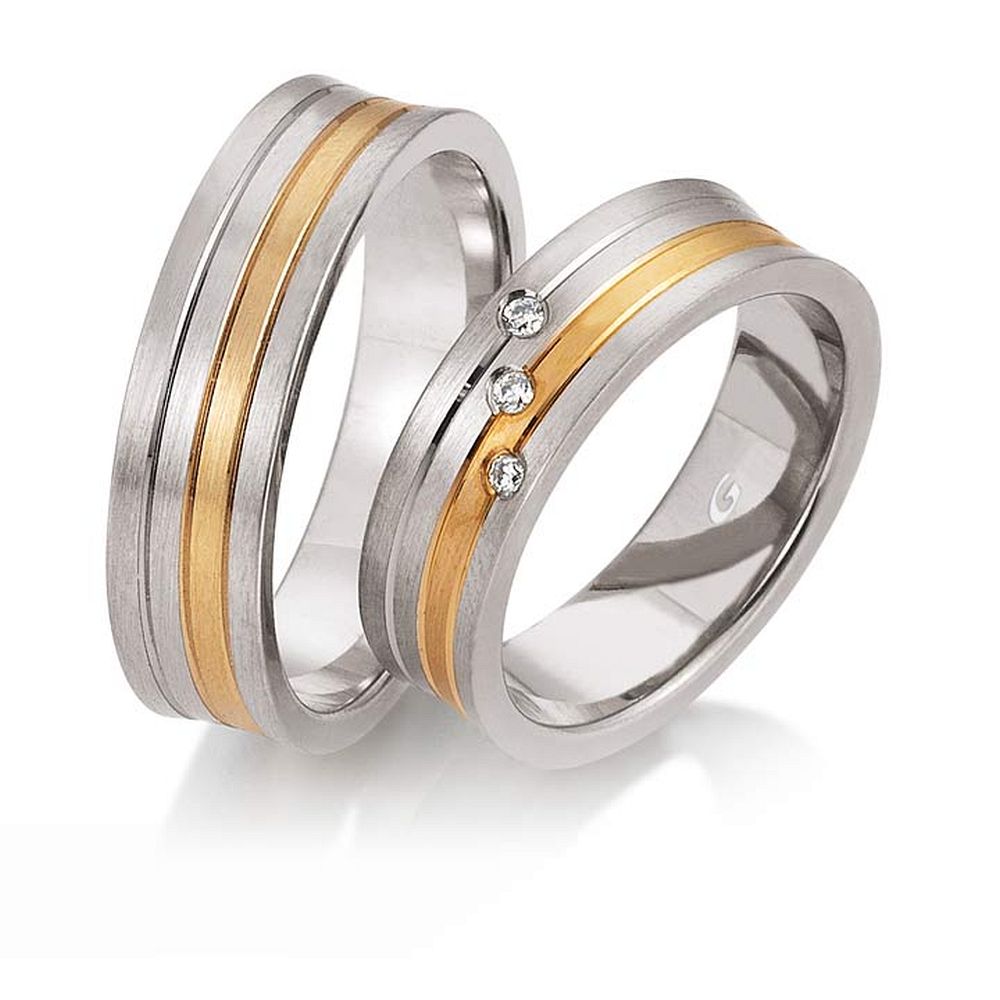 De Gettmann trouwringen worden gemaakt in Duitsland.
Dit set in 585 wit- en rose goud heeft een breedte van 6mm.
De damesring is gezet met diamant, briljant slijpsel, en heeft een totaal gewicht van 0,045ct SI-TW.

Gettmann trouwringen zijn in meerdere gehaltes en kleuren leverbaar. Vraagt u ons naar de actuele prijzen en mogelijkheden. 

