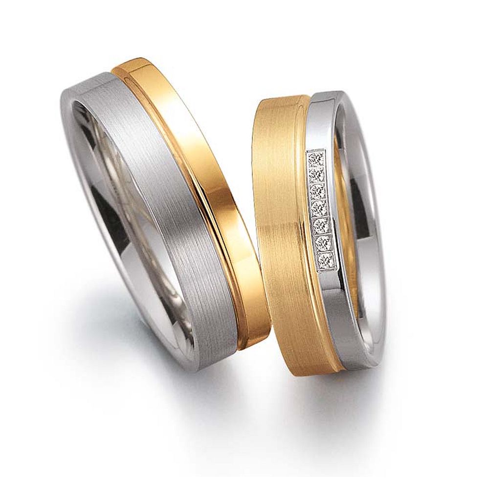 De Gettmann trouwringen worden gemaakt in Duitsland.
Dit set in 585 wit- en geelgoud heeft een breedte van 6mm.
De damesring is gezet met diamant, briljant slijpsel, en heeft een totaal gewicht van 0,035ct SI-TW.

Gettmann trouwringen zijn in meerdere gehaltes en kleuren leverbaar. Vraagt u ons naar de mogelijkheden en actuele prijzen.

