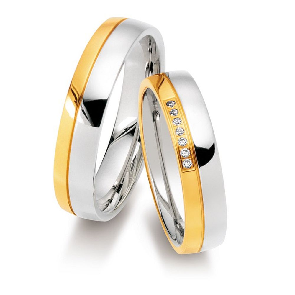 De Gettmann trouwringen worden gemaakt in Duitsland.
Dit set in 585 wit- en geelgoud heeft een breedte van 5mm.
De damesring is gezet met diamant, briljant slijpsel, en heeft een totaal gewicht van 0,025ct SI-TW. Gettmann trouwringen zijn in meerdere gehaltes en kleuren leverbaar. Vraagt u ons naar de actuele prijzen en mogelijkheden.

