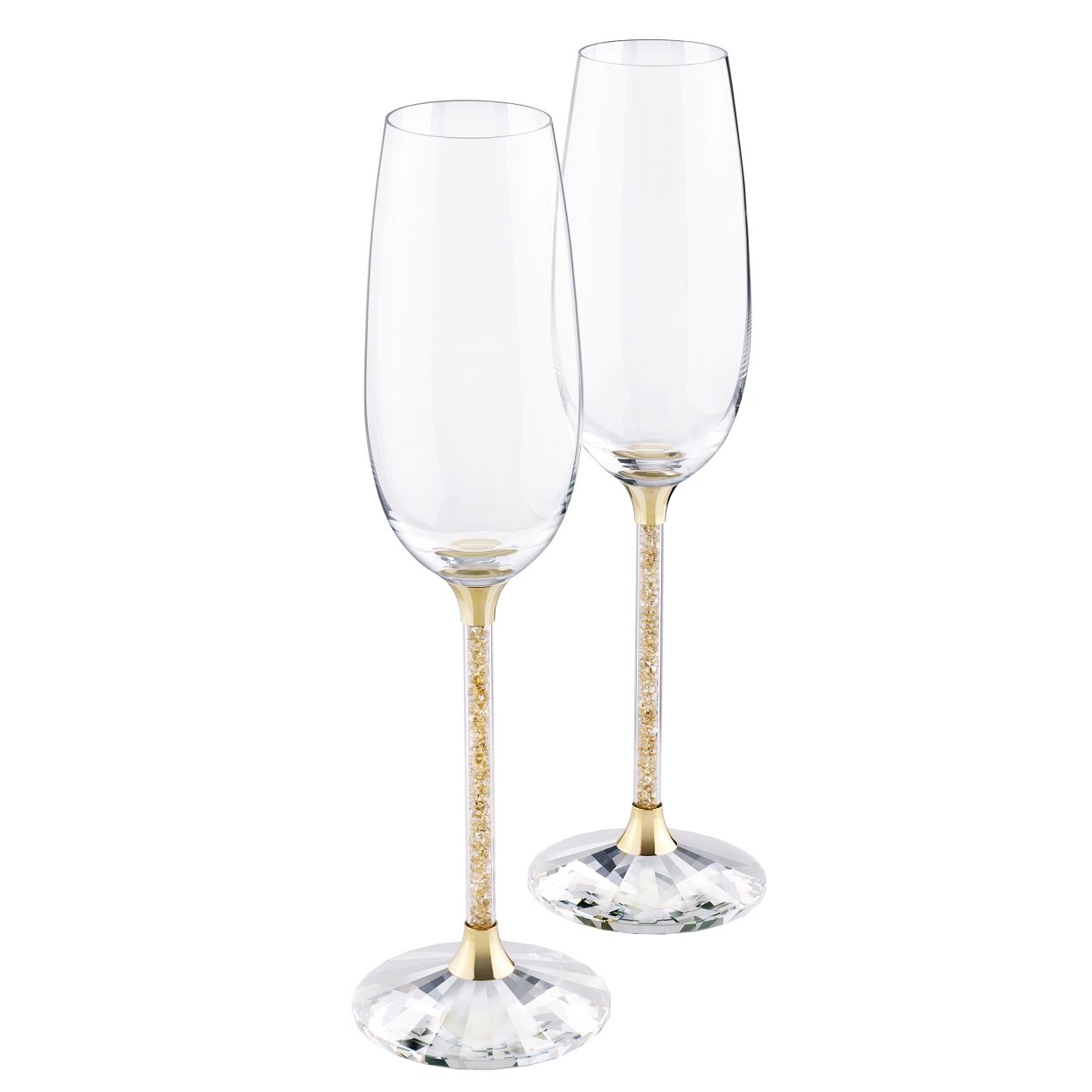 Deze delicate, elegante en zeer feestelijke set van twee flutes is voor zeer speciale gelegenheden. Met goudgecoat metaal en stelen gevuld met Golden Shadow-kristallen voegen ze romantiek toe aan elke avond. Geen speelgoed. Niet geschikt voor kinderen jonger dan 15 jaar.