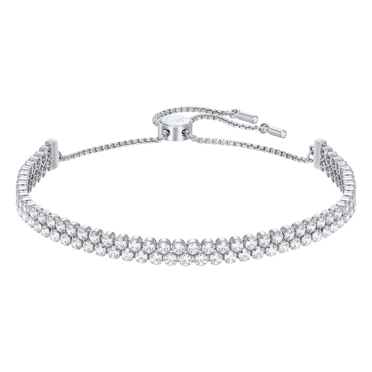 Deze tijdloze rodium-vergulde armband is een ideaal cadeau voor liefhebbers van sprankeling. Twee delicate snoeren met heldere kristallen zijn ingezet in een nieuw cupchain-ontwerp. De armband sluit mooi aan om de pols en is afgewerkt met een innovatieve nieuwe glijdende kogelsluiting, waardoor de klant de maat gemakkelijk kan aanpassen voor de perfecte pasvorm. De zowel mooie als ingetogen armband is ook een gedurfd statement van elegantie. Draag hem met een Swarovski-horloge voor sprankeling voor overdag of til de glamour naar een hoger niveau voor een avondje uit door hem te combineren met contrasterende stijlen.