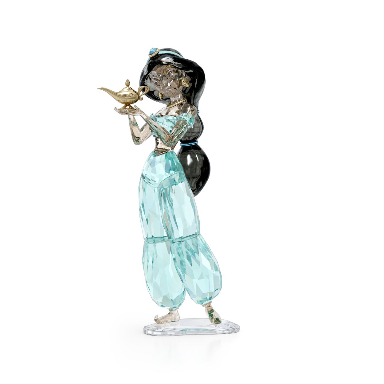 Ga op een magische reis naar de wereld van Disney's Aladdin met dit authentieke figuurtje van Prinses Jasmine. Het figuurtje, dat is vervaardigd uit kleurrijk kristal met 547 facetten en versierd met goud kleurtoon  metalen juwelen, straalt zelfvertrouwen en onafhankelijkheid uit en houdt de magische lamp vast. Een schitterend voorbeeld van vakmanschap, ideaal om fans van Disney en Swarovski cadeau te doen. Decoratieobject. Geen speelgoed. Niet geschikt voor kinderen jonger dan 15 jaar.