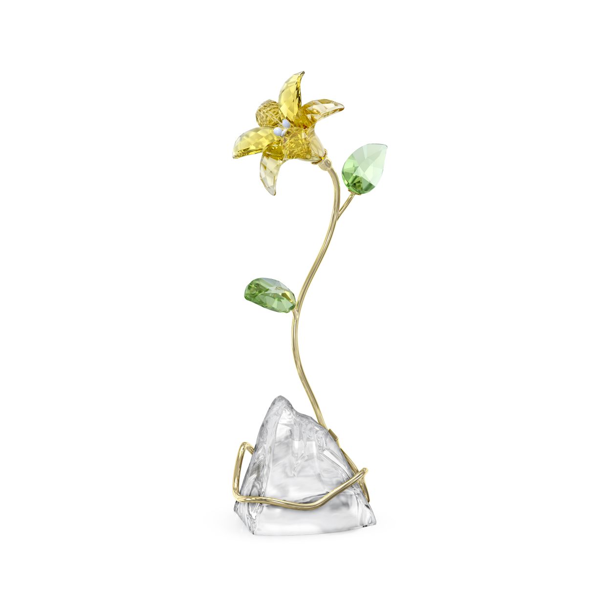 Deze stralende lelie is een prachtig voorbeeld van de savoir-faire van Swarovski. De gele bloem bestaat uit 222 schitterende facetten en is voorzien van groene kristallen bladeren op een goudkleurige metalen stengel die zich elegant om een voetstuk van natuurlijk kristal zonder facetten wikkelt. Dit vrijstaande ontwerp staat symbool voor zuiverheid en onschuld en vormt een elegante aanwinst in elk interieur. Er is geen vaas of onderstuk nodig. Decoratief voorwerp. Geen speelgoed. Niet geschikt voor kinderen jonger dan 15 jaar.