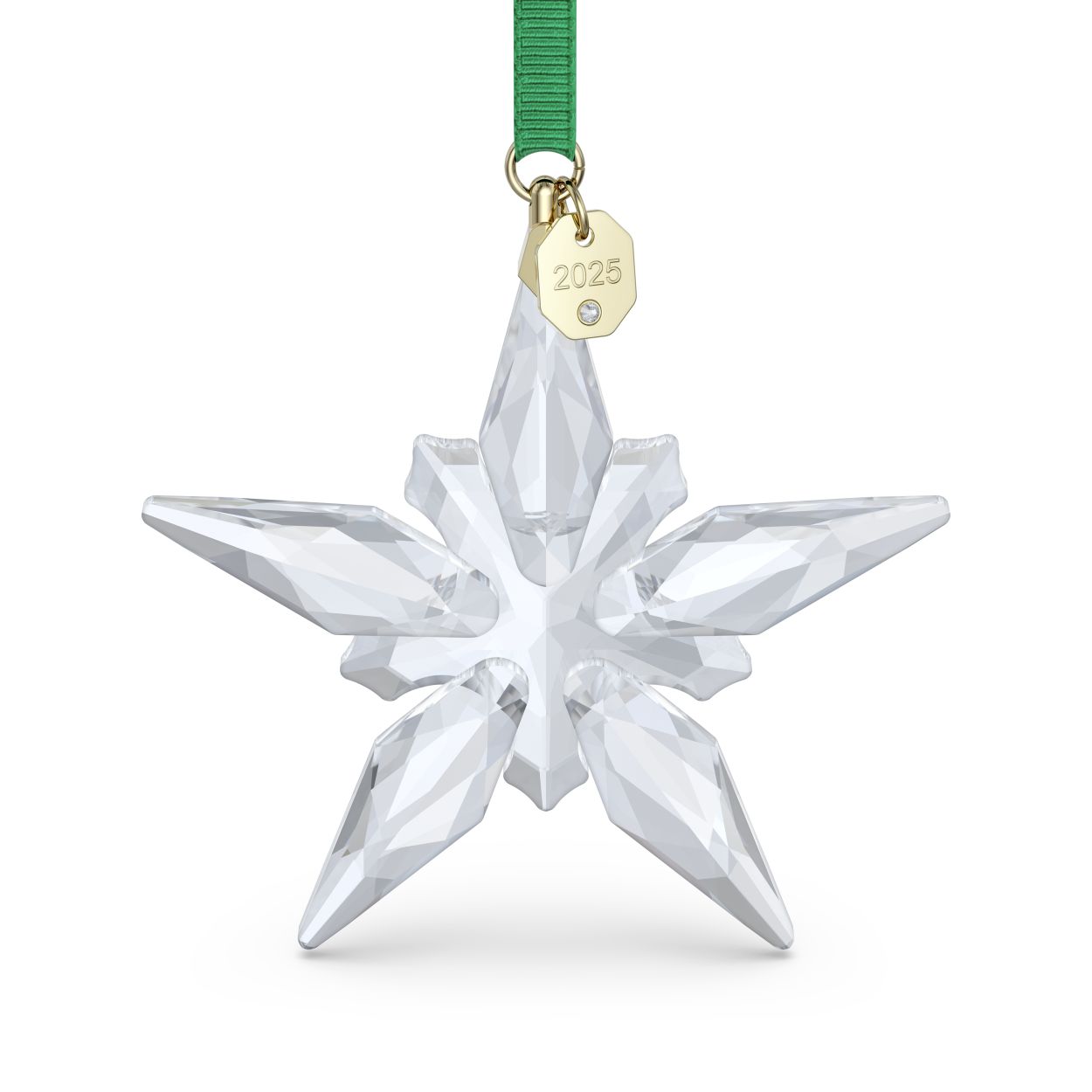 Vier een van de traditionele hoogtepunten van het seizoen met dit Swarovski Annual Edition Ornament. Het stervormige ontwerp aan een groen ripsband lint met champagnegoudkleurige accenten is precisiegeslepen met 170 lichtvangende facetten en belichaamt op prachtige wijze de complexe eenvoud en technische vaardigheid van Swarovski. Het ontwerp is afgewerkt met een gegraveerd label met �2025�. Dit ornament is perfect om in de kerstboom, voor het raam of ergens anders in huis op te hangen en vormt daarmee een werkelijk prachtige manier om uw versiering tijdens de feestdagen te benadrukken. Decoratief voorwerp. Geen speelgoed. Niet geschikt voor kinderen onder de 15 jaar.