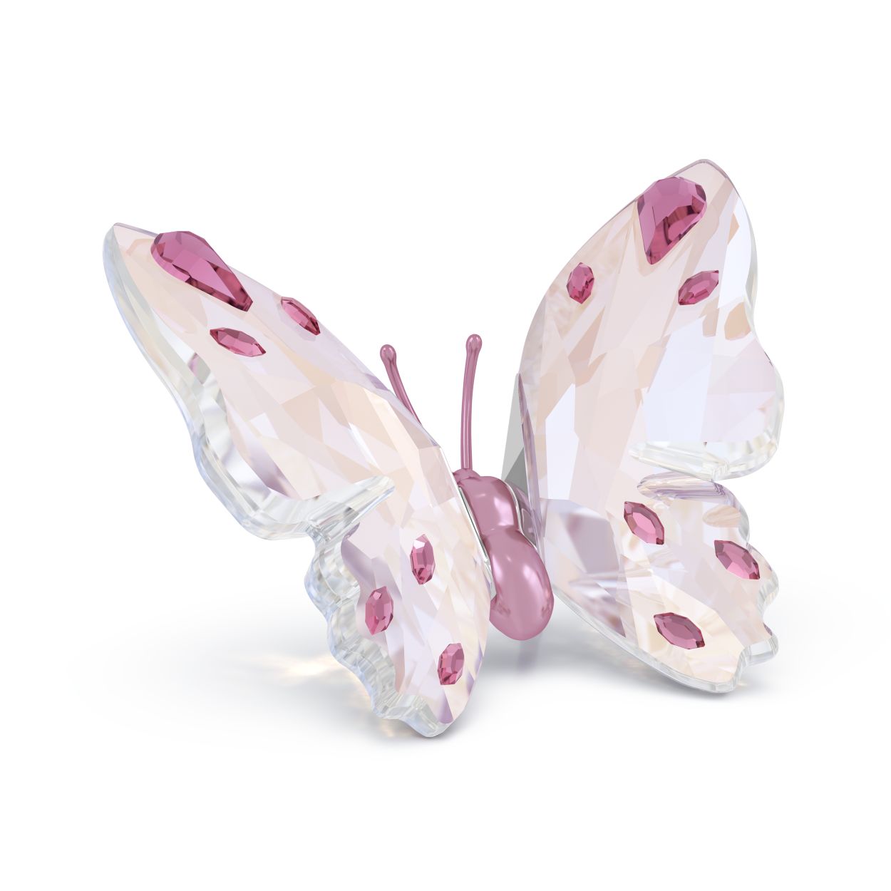 Deze delicate vlinder spreidt trots zijn glinsterende vleugels. Deze vakkundig vervaardigde creatie symboliseert vrijheid en gratie. Het ontwerp is geïnspireerd op de natuur en wordt tot leven gebracht met 162 facetten, 12 afzonderlijke kristallen en een combinatie van roze tinten met rosékleurige gelakte metalen accenten. Een prachtig symbool van transformatie en vreugde dat uw hele interieur opfleurt. Decoratief voorwerp. Geen speelgoed. Niet geschikt voor kinderen onder de 15 jaar.