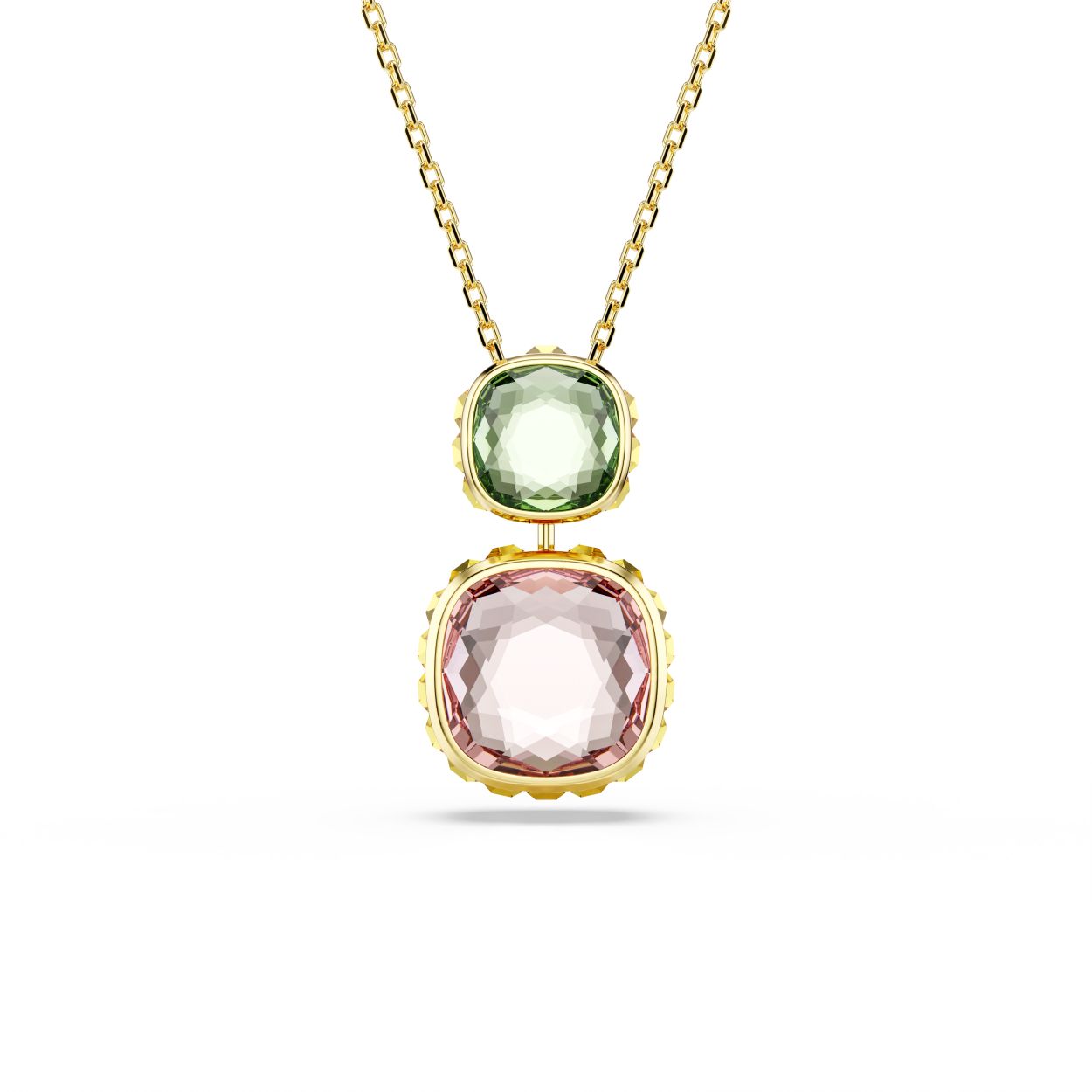 Welke kleur u ook kiest, deze levendige Chroma Twist-hanger past bij elke stemming. Het ontwerp met goudkleurige toplaag is met de ketting verbonden door een groen Swarovski ReCreated crystal. Daaronder bevindt zich het omkeerbare ontwerp, wat betekent dat u een blauw Swarovski ReCreated crystal of levendig roze kristal kunt laten zien. Draai de hanger om zodat deze bij uw stijl past en draag hem samen met andere Chroma Twist-sieraden voor een vrolijke uitstraling. Chroma Twist-sieraden bevatten minimaal 50% Swarovski ReCreated crystals. Het is onze eerste collectie die is ontworpen met het oog op circulariteit.