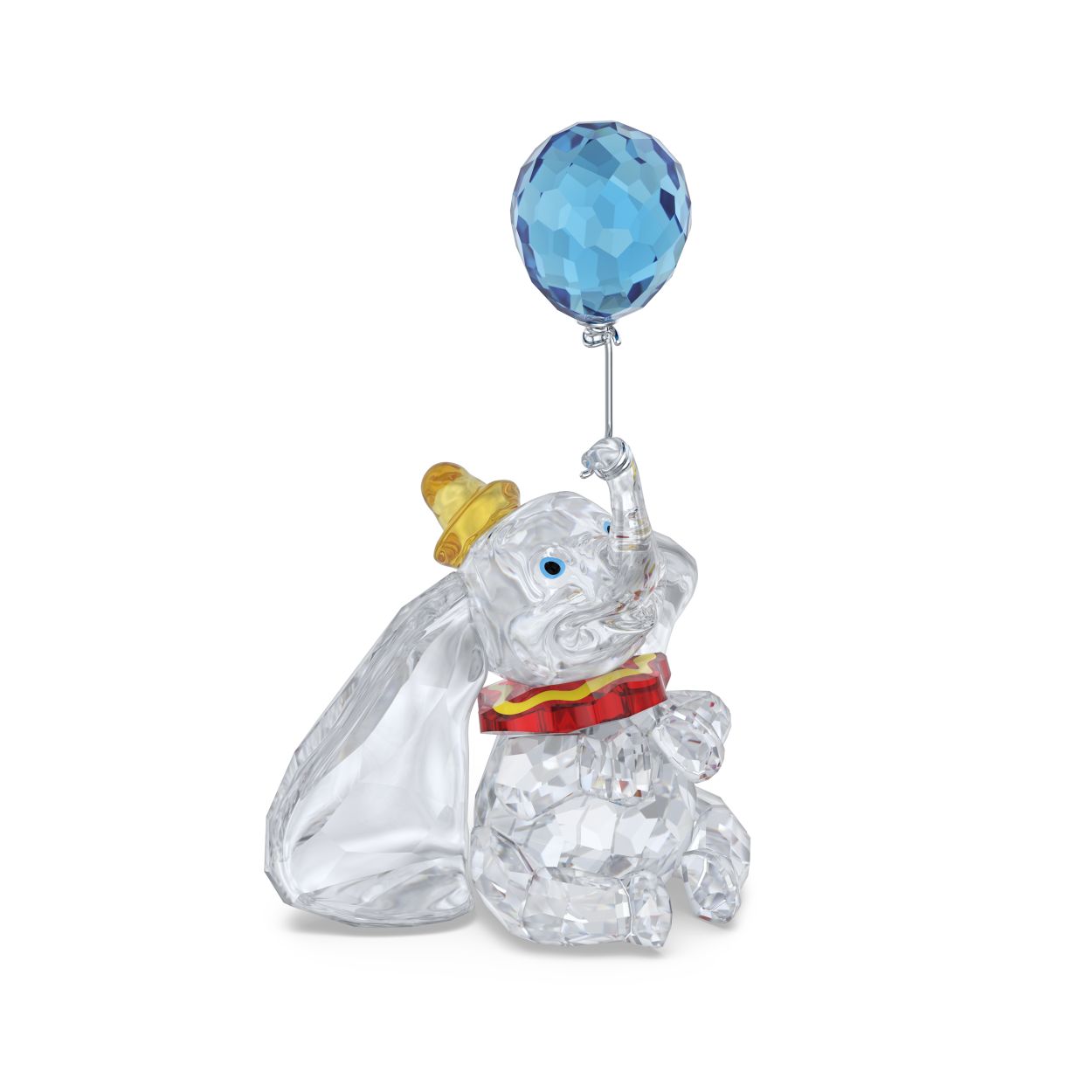 Voor iedereen die ervan droomt om zelf te kunnen vliegen, is deze klassieke figuur die is ge&Iuml;nspireerd op Disney's Dombo de perfecte decoratie. Het geliefde Disney-personage is met precisie vervaardigd met 827 facetten en is afgebeeld met zijn onmiskenbare lange oren, kleurrijke circusoutfit en een zwevende blauwe ballon. Een aandoenlijk verzamelobject voor elke Disney-fan, dat ongetwijfeld een hoop dierbare jeugdherinneringen zal oproepen. Decoratief voorwerp. Geen speelgoed. Niet geschikt voor kinderen onder de 15 jaar.