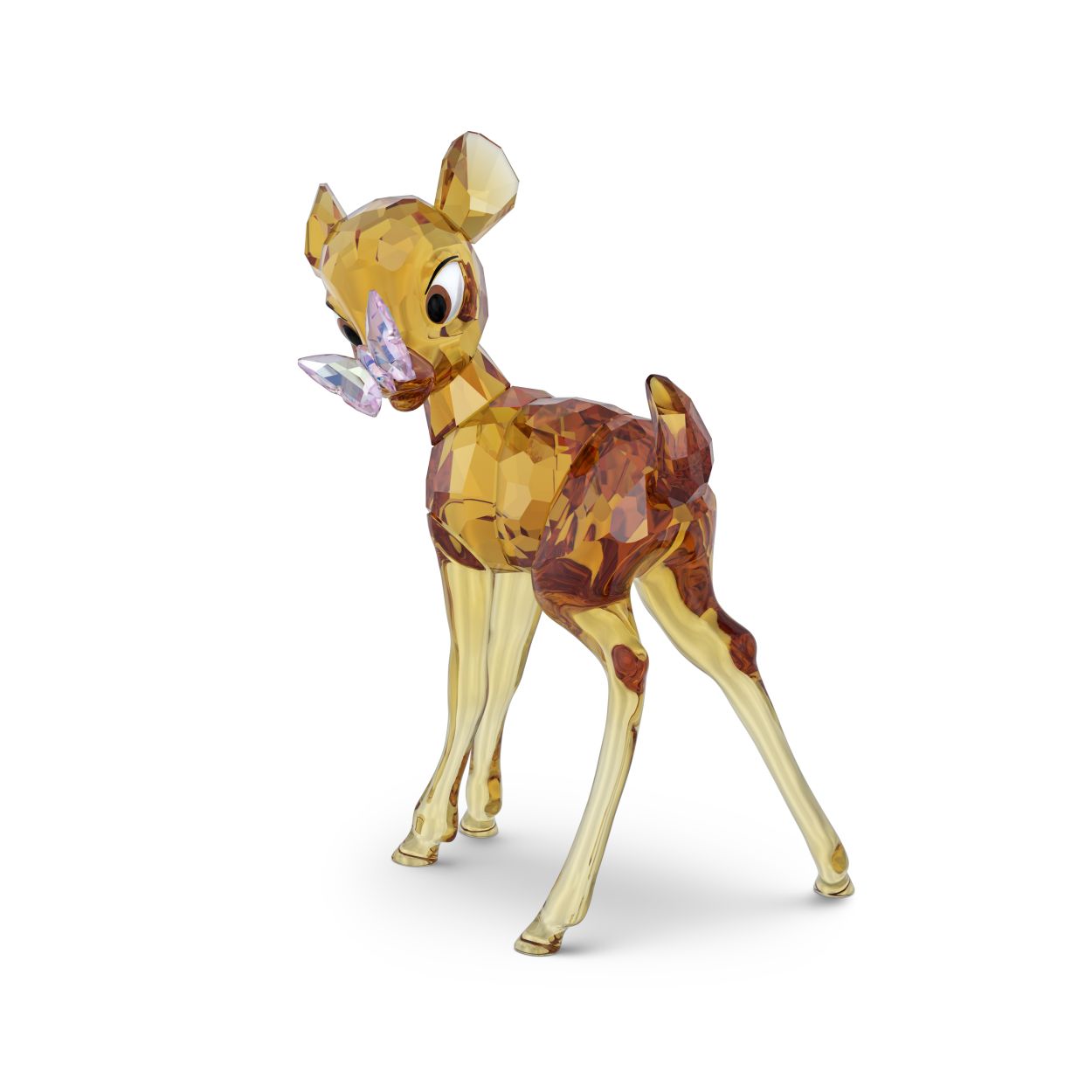 Deze Bambi-figuur is geÏnspireerd op een van Disneys populairste en schattigste personages. Haal herinneringen op aan uw jeugd met het speelse ontwerp in een voorjaarsbos waarin Bambi een glinsterende vlinder begroet. Het tafereel komt tot leven met 577 precisiegeslepen facetten. Het is een aandoenlijk verzamelobject waar elke Disney-fan een glimlach op zijn of haar gezicht van krijgt. Decoratief voorwerp. Geen speelgoed. Niet geschikt voor kinderen onder de 15 jaar.