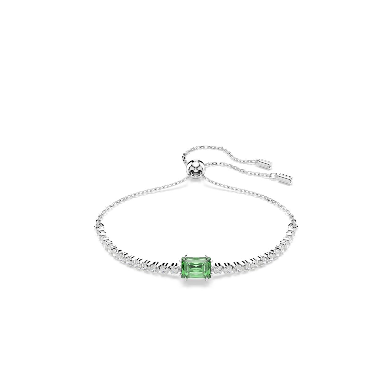 Deze klassieke tennisarmband voegt een vleugje glans toe aan elke look en combineert heldere Swarovski Zirkonia met een kleuraccent. Het sieraad met rhodium toplaag en schuifsluiting heeft een gelijkmatige rij heldere Swarovski Zirkonia en wordt geaccentueerd door een groene Swarovski Zirkonia in Baguette-slijpvorm in het midden. Een levendige twist van een tijdloze stijl.
