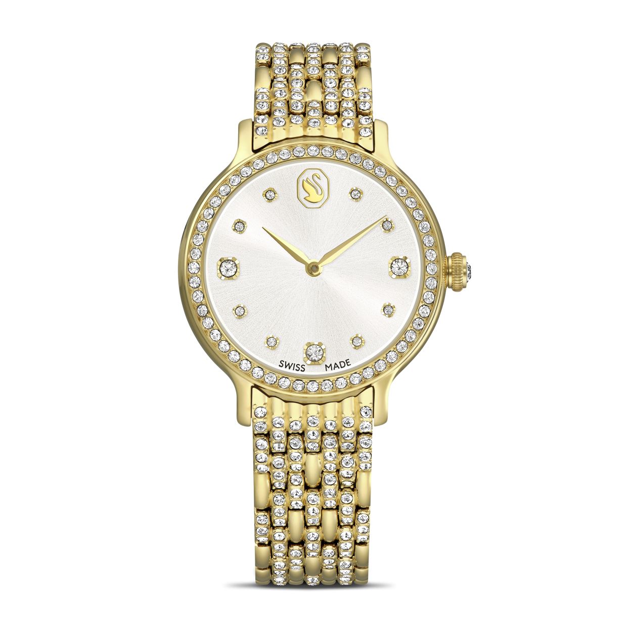 Dit glinsterende Imber-horloge, versierd met 232 individuele kristallen, is Swarovski's mooiste uitdrukking van tijdloze elegantie. Het edelstalen ontwerp van 31 mm heeft een goudkleurige afwerking en is voorzien van een pavé lunette bezet met 52 heldere kristallen. In de kroon is nog een extra kristal geplaatst. Op de wijzerplaat met zonnestralenpatroon zijn 11 kristallen in kleine en grote maten gebruikt om de uren aan te geven, samen met een zwaanlogo op 12 uur. Om de pols is het meest opvallende kenmerk van het horloge de verstelbare armband met zeven schakels, die prachtig bezet is met 168 kristallen in Round-slijpvorm. Dit Swiss Made horloge is waterbestendig tot 50 meter en past naadloos bij de selectie Imber-sieraden van Swarovski.