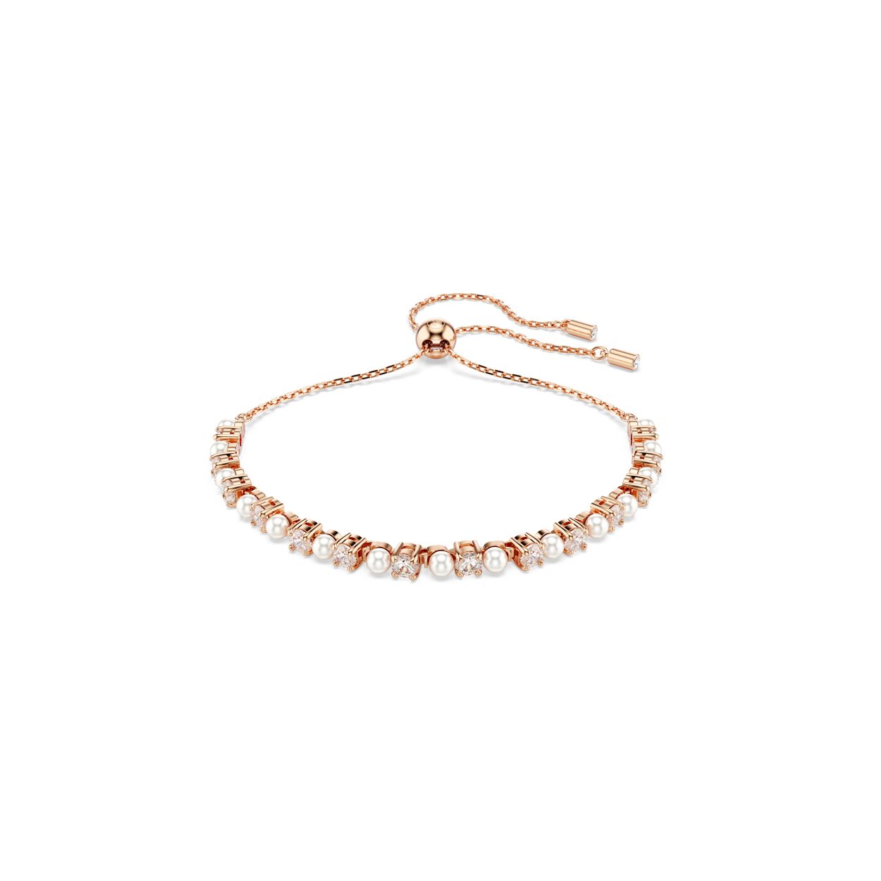 Deze verfijnde Matrix-armband is een statement van pure elegantie. De delicate ketting met rosegoudkleurige toplaag is bezet met een afwisseling van witte Swarovski Crystal Pearls en Swarovski Zirkonia in klauwzetting, die een sprankelende combinatie van subtiele kleur en licht vormen. Draag het met een paar bijpassende Matrix-oorbellen om elke dag te schitteren.