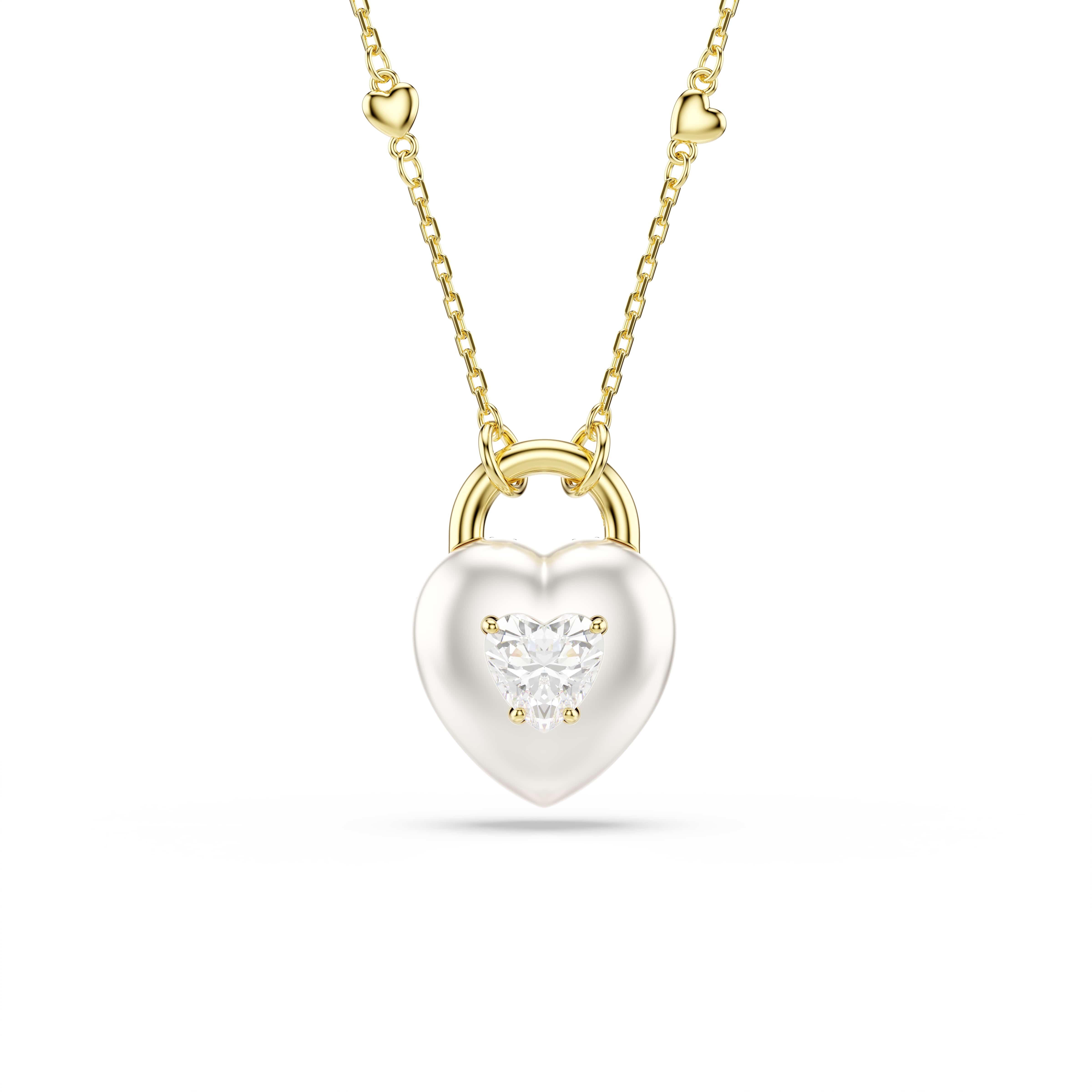 Deze romantische hanger symboliseert de geheimen van de liefde en heeft een op een medaillon ge&iuml;nspireerd hartmotief, dat gemakkelijk op twee verschillende manieren kan worden gedragen. Aan de ene kant vindt u een oppervlak met rhodium toplaag met een enkel hartvormig kristal, en aan de andere kant een stralende zetting van Swarovski Zirkonia in chatonnage-stijl. Het motief hangt aan een delicate goudkleurige ketting, die zelf is gedecoreerd met kleine hartvormige kralen.