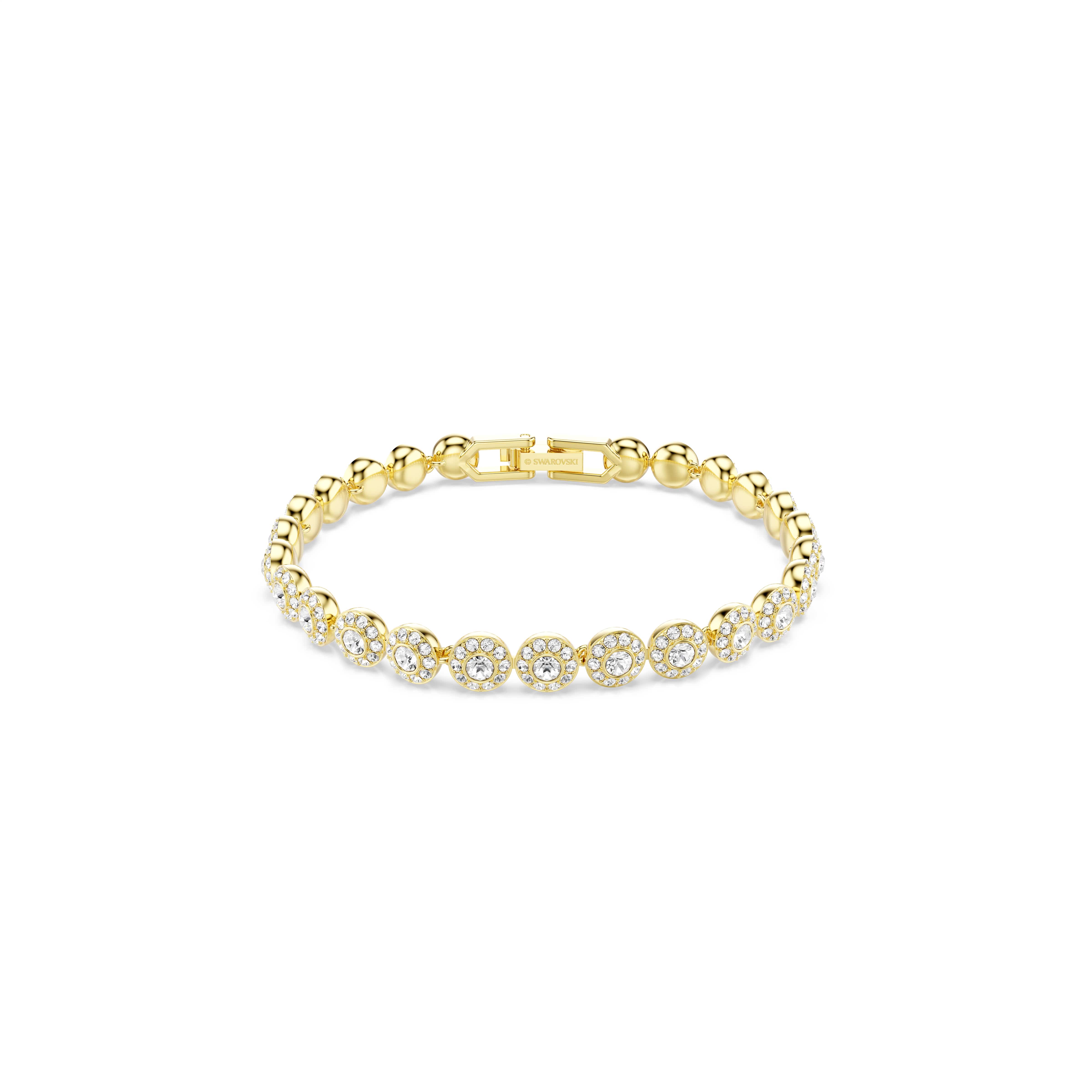 Pure, tijdloze elegantie. Deze armband met goudkleurige toplaag bevat een rij heldere kristallen in Round-slijpvorm, elk ingelijst in sprankelende heldere kristallen pav&eacute;. Perfect te combineren met andere items uit de Una Angelic-familie.