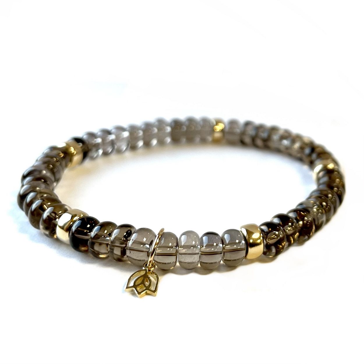 Edelstenen armband 6x4mm kralen  Vijf 14kt gouden beads  tulp logo
De YG Jewelry armbanden hebben een luxe uitstraling zijn perfect om solo te dragen maar je kunt ze uiteraard ook combineren.
