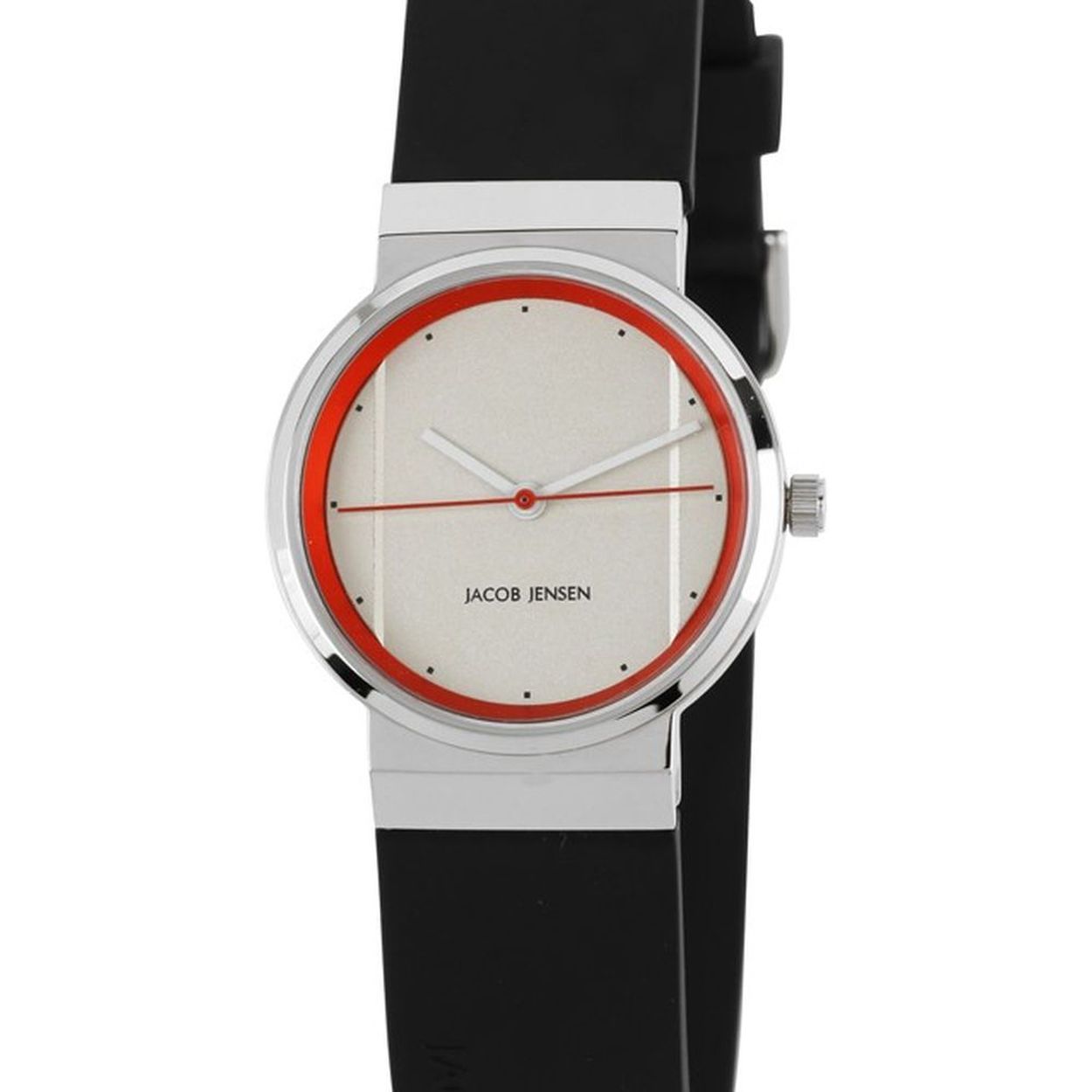e Jacob Jensen New 765 is een horloge met over het midden van de wijzerplaat een verticale verdieping, als een optische verlenging van de horlogeband. De karakteristieke dubbele secondewijzer is oranje-rood, net als de rand onder het minerale glas. De kast van het horloge is van glanzend roestvrij staal en aan het horloge zit een zwart rubberen horlogeband, die door de bijzondere bevestiging eenvoudig (zelf) uit te wisselen of te vervangen is.

In het 29 millimeter brede dameshorloge huist een betrouwbaar Zwitsers uurwerk.