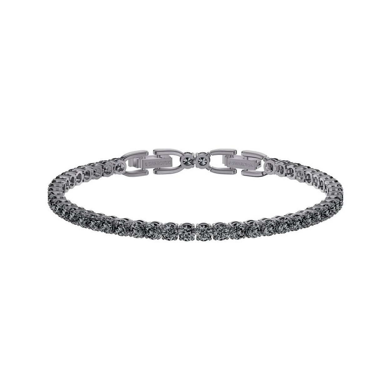 Deze klassieke Tennis-armband met ruthenium toplaag zit boordevol subtiele sprankeling, heeft een eigentijdse look, en kan zowel bij zakelijke als casual looks worden gedragen. Hij heeft een verfijnd snoer met ronde donkergrijze kristallen in klauwzetting. Een elegante en minimalistische musthave voor dagelijks gebruik.