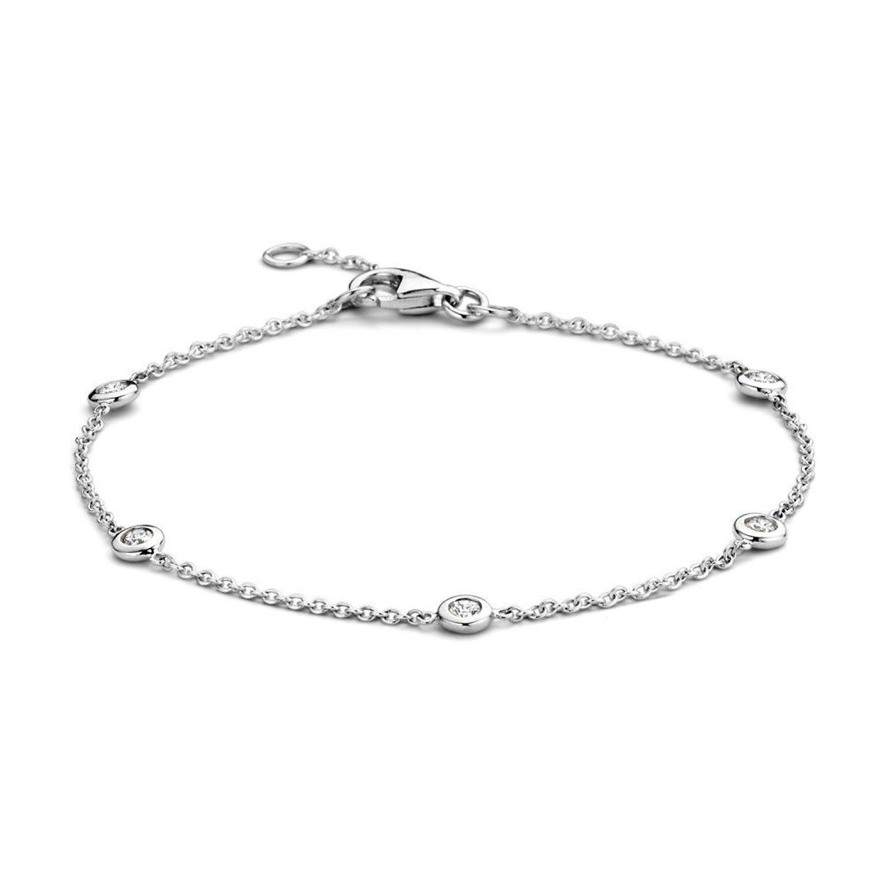 14 karaat witgouden armband met daarin 5 briljanten in een donut zetting. Totaal 0.26 crt briljant H/SI. Armband voorzien van een karabijnhaak sluiting.
