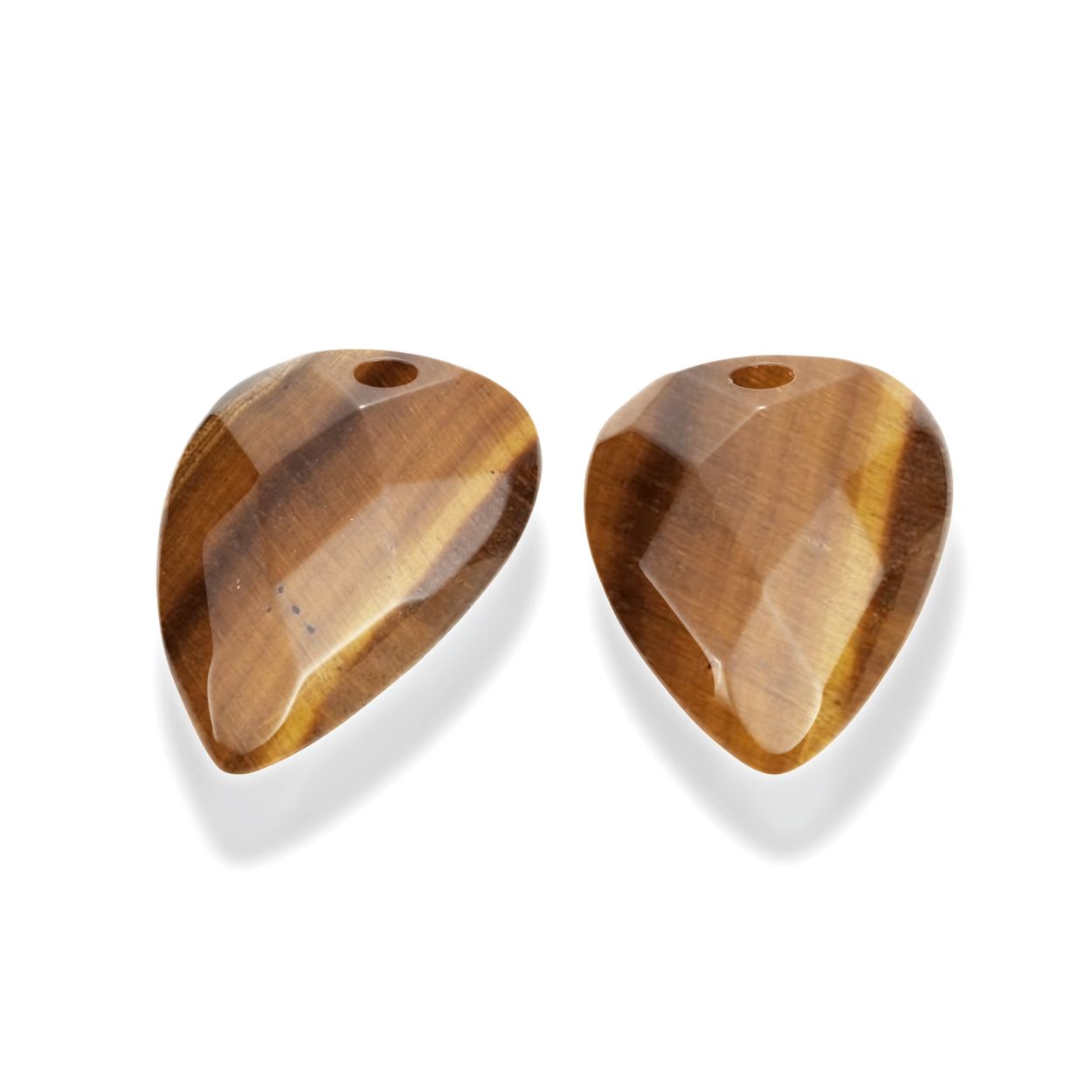 Sparkling Jewels biedt een kleurrijke collectie door het gebruik van de fijnste edelstenen. De gefacetteerde Tiger Eye Blossom oorstenen zijn perfect om te combineren met verschillende oorbellen.

Gefacetteerde Tijgeroog edelstenen
Lengte 33mm x Breedte 21mm
