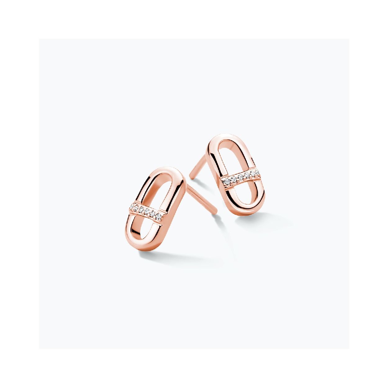 Dit zijn creolen van het merk FJF Jewellery. De kleur van de creolen is rosegoud. Dit sieraad bevat de edelsteen: zirconia van swarovski. De kleur van deze edelsteen is: wit.