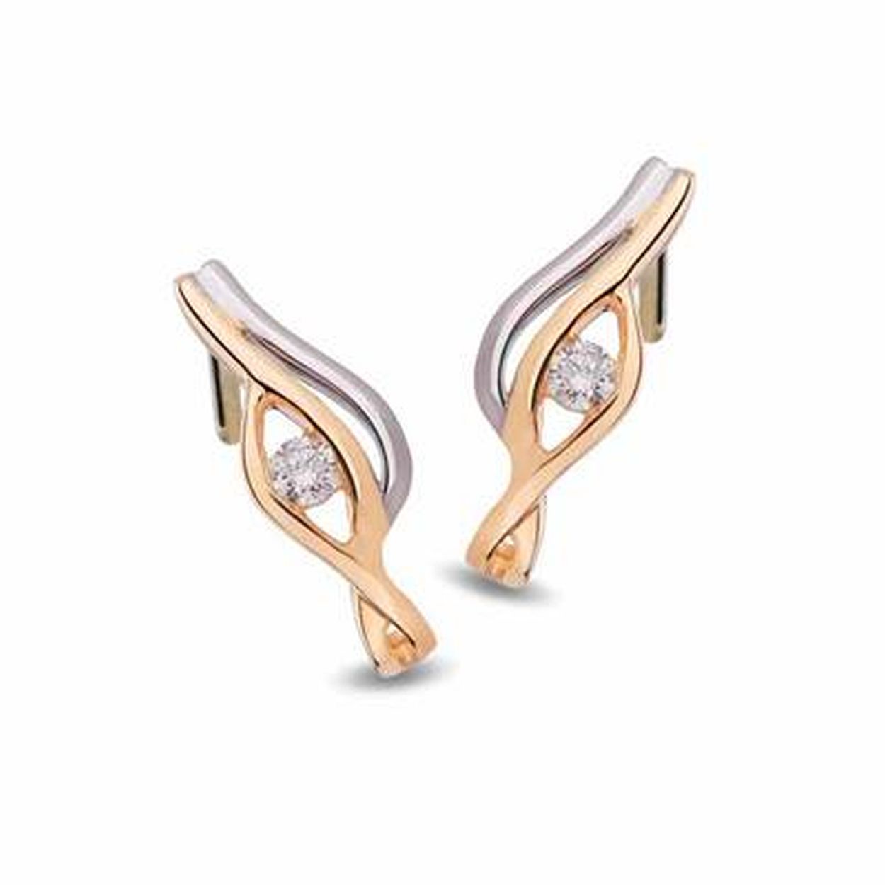 Prachtige oorknoppen in het wit- met geelgoud en een diamant van 0,75 crt.