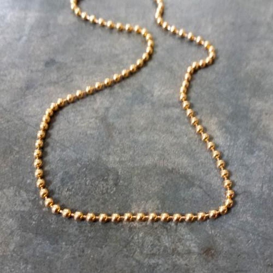 Verguld bolletjes collier