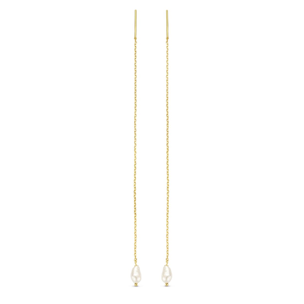 Amalfi Pearl Threader Earrings In de Amalfi Pearl Threader Earrings zijn prachtige Baroque parels verwerkt die Jackie doen denken aan de Amalfi kust. Combineer deze 14K doortrekoorbellen met de Pearls of Amalfi Necklace voor een statement look. We love it! Jackie heeft tijdens haar reis naar Italië inspiratie opgedaan aan de betoverende Amalfi kust. De prachtige roze tinten in de huizen die variëren van Opaal, Rozenkwarts, Amethist tot aan Robijn, zijn de oorsprong van de ringen in de nieuwe Jackie collectie “Magical Amalfi”. Dagelijks dronk Jackie haar krachtige Macchiato; de koffieboon-vormige schakels van de armbanden en colliers herinneren hieraan. De Baroque parels, die Jackie doen denken aan de kust, zijn dé eyecatcher in deze collectie van echt 14 karaat goud. Specificaties - Doortrekoorbellen - Materiaal: 14 Karaat - Geelgoud - 585 - Lengte: 12cm - Artikelnummer: JKE22.204