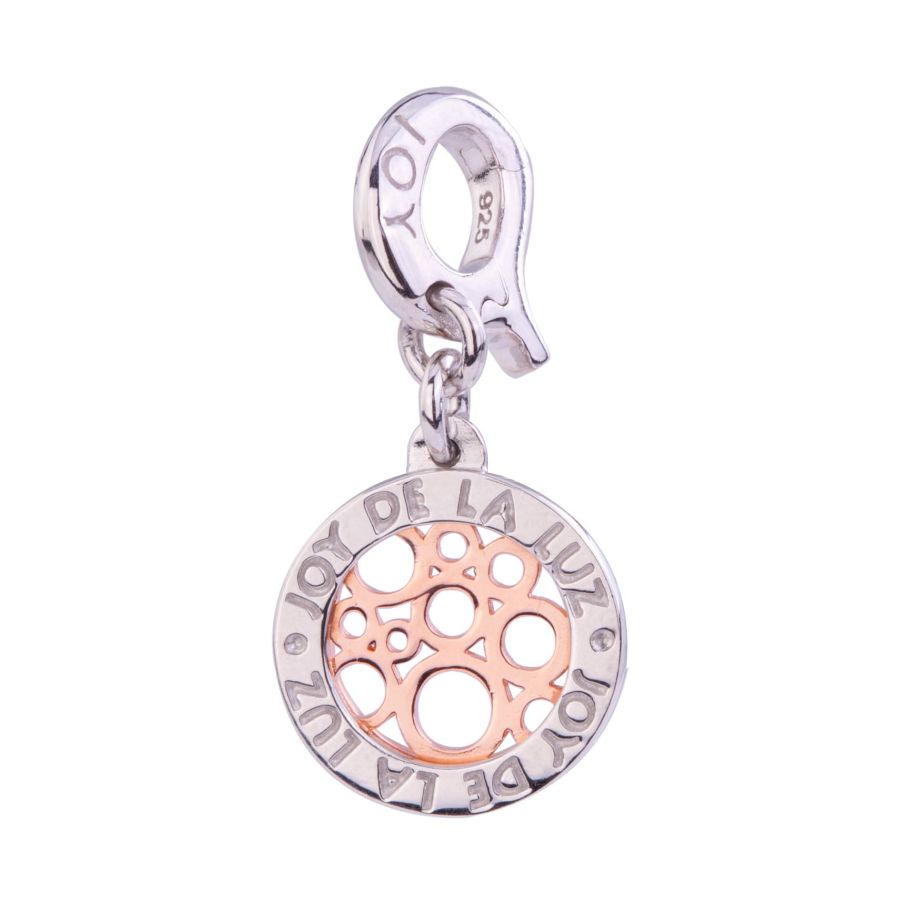 Coin Round about Rosé van het merk Joy de la Luz. Munt met rosé vergulde uitgesneden cirkels, gemaakt van 925 Sterling zilver. Geschikt om aan een armband of collier te bevestigen.