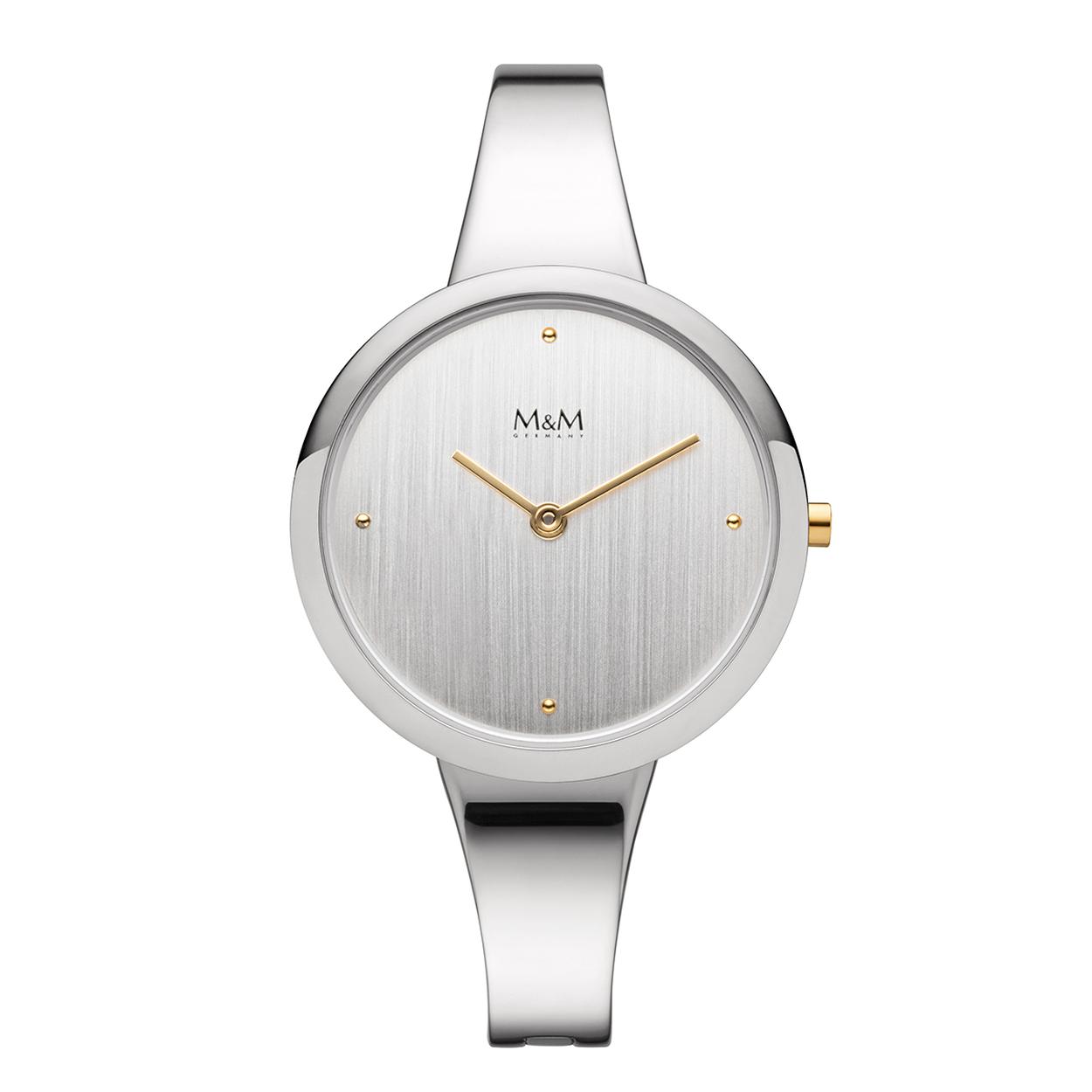 Dit M&M horloge is een dameshorloge. De diameter van de kast is 34 mm. De kast is zilver van kleur. De band is gemaakt van edelstaal en is zilver van kleur. Het glas van het horloge is gemaakt van gehard mineraal. De waterdichtheid is 3 ATM.