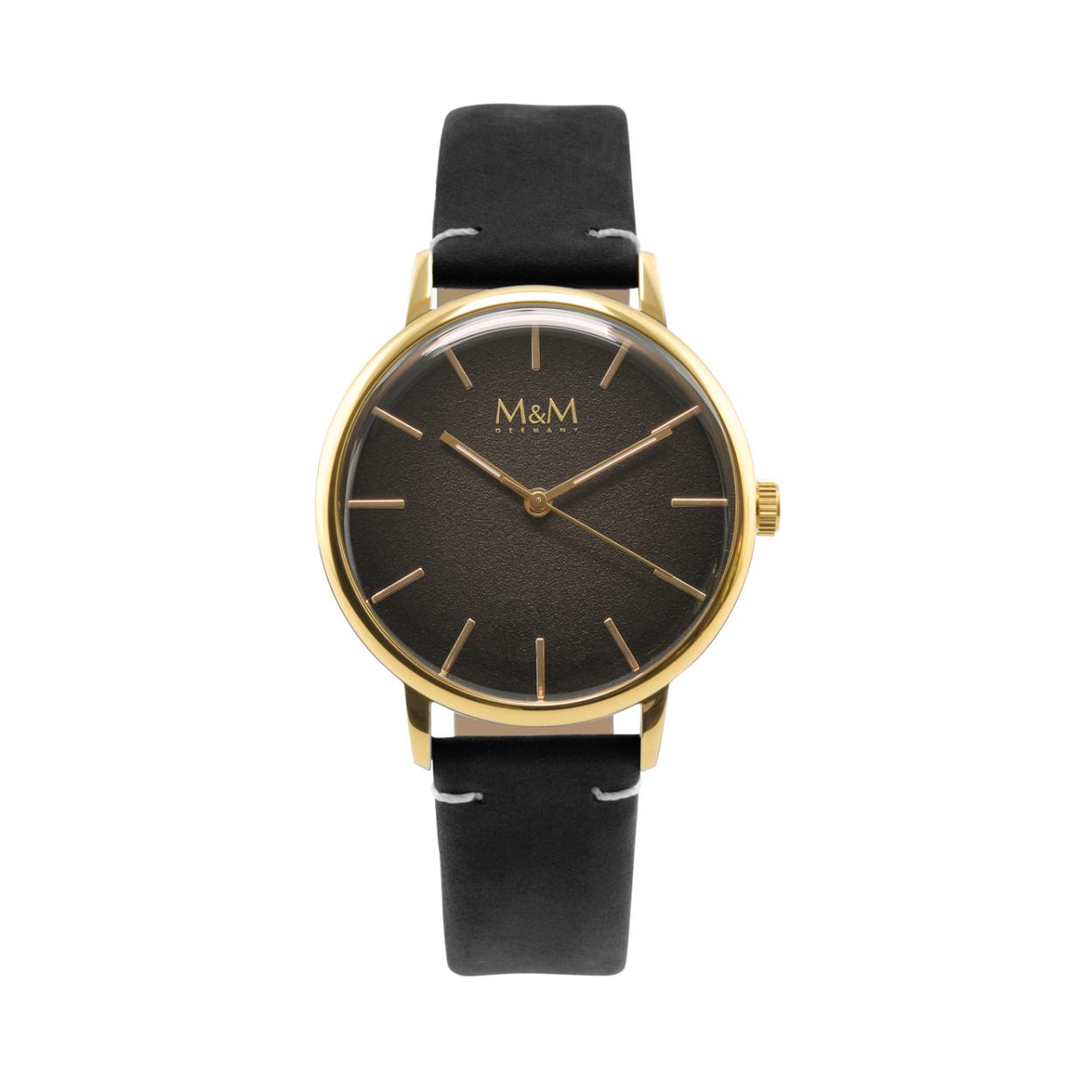 Dit M&M horloge is een unisexhorloge. De diameter van de kast is 38 mm. De kast is goud van kleur. De band is gemaakt van nubuk-leder en is zwart van kleur. Het glas van het horloge is gemaakt van gehard mineraal. De waterdichtheid is 3 ATM.