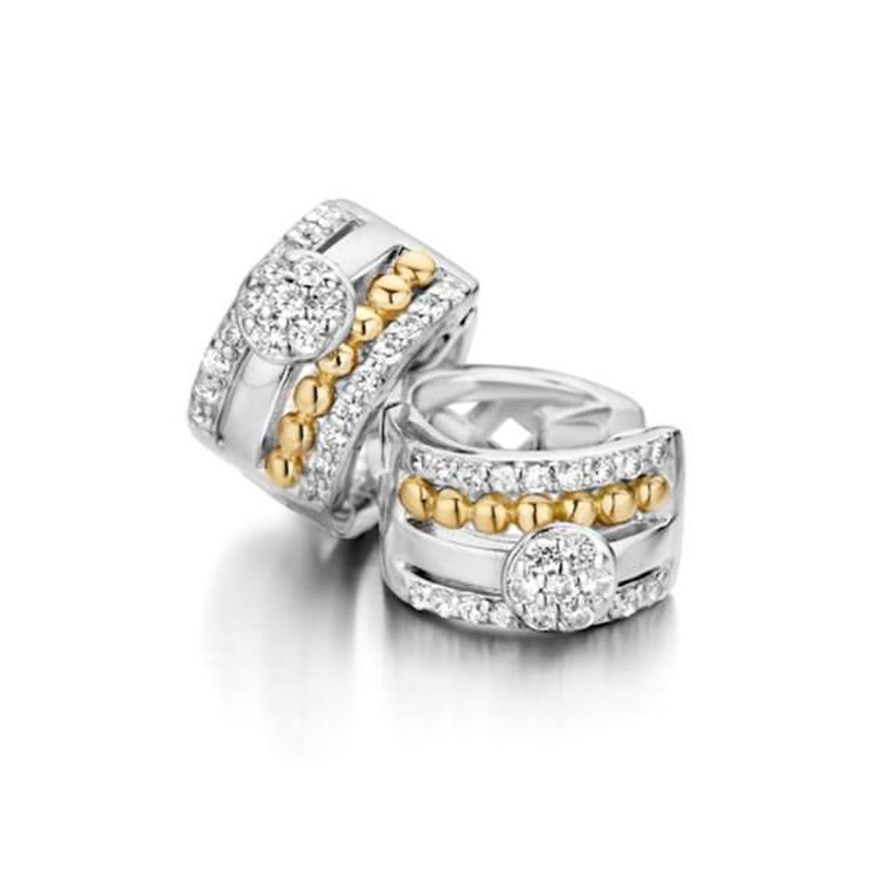 Zilver met 14 karaat gouden creolen en zirkonia Deze oorbellen zijn onderdeel van een set.