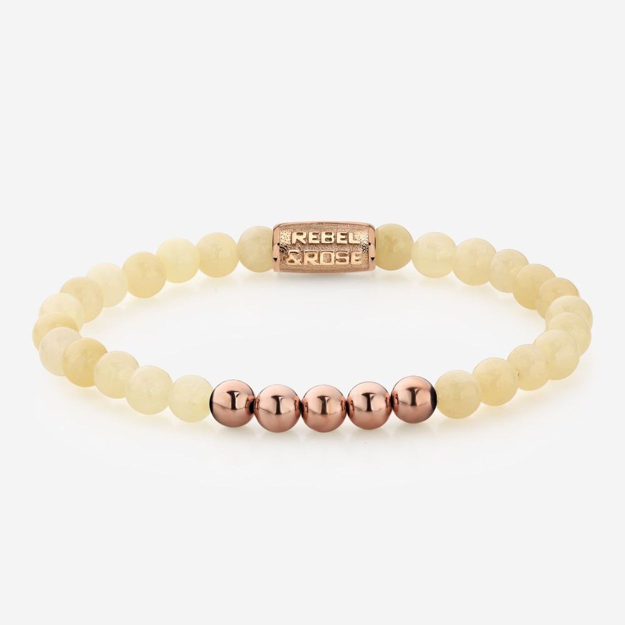 Natuurstenen armband van het merk Rebel & Rose. De armband heeft een hoogwaardige elastische stretch koord, 6mm Beige Jasper natuurstenen beads en rose-goldplated metalen slotje
