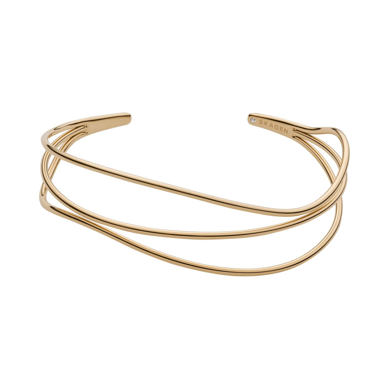 De SKAGEN ARMBAND DAMES SKJ1216710 is een elegante damesarmband van roestvrij staal met een gouden kleur. Met een breedte van 61 mm en een gewicht van 8 gram biedt dit juweel een verfijnde stijl. Perfect om solo of met andere accessoires te dragen voor een chique, minimalistische look. Geschikt voor een polsmaat van 80 mm.