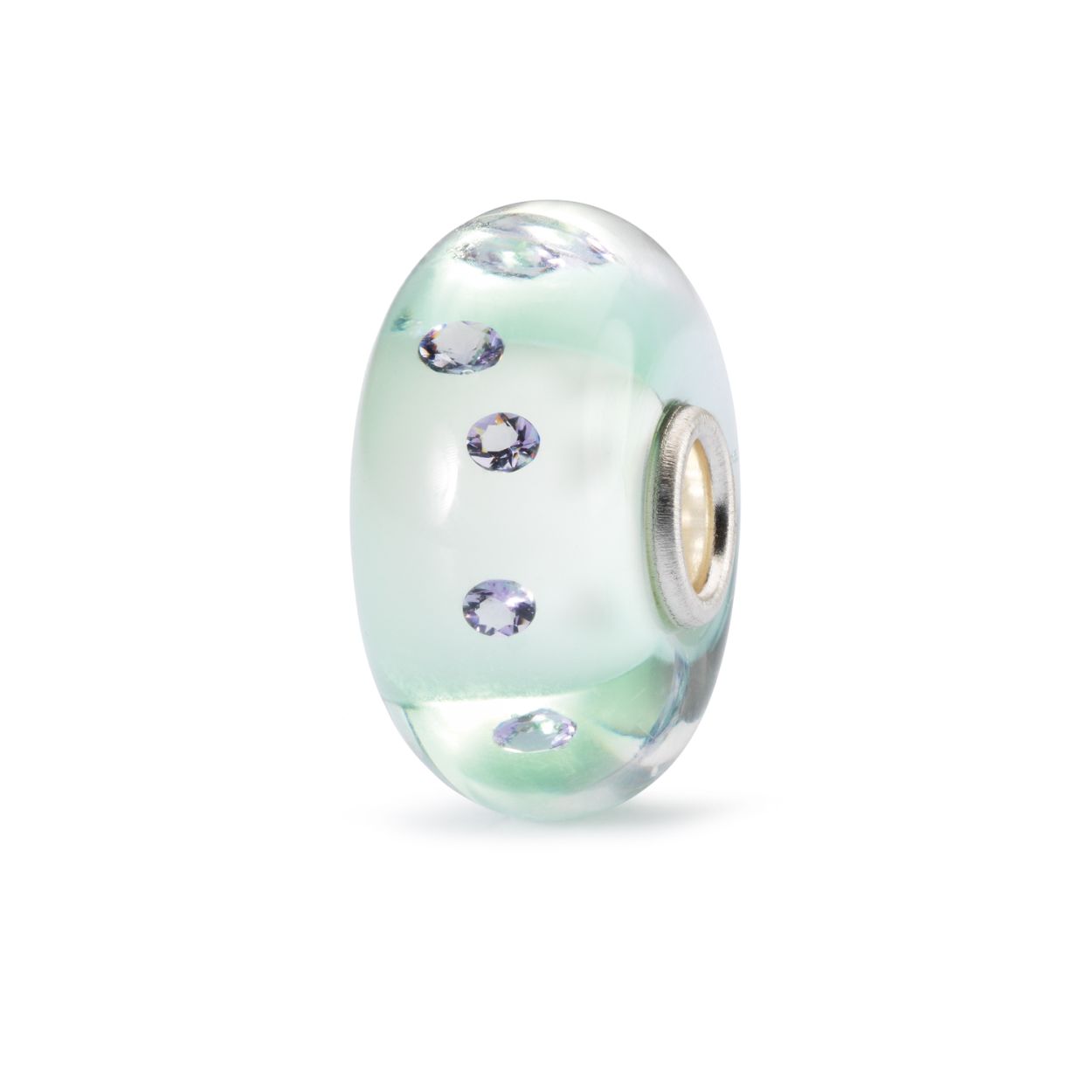 Helend Hart - glazen bead van het sieradenmerk Trollbeads. De bead heeft een lichtgroene kleur en verschillende blauwe accenten (zirkonia). Deze bead staat symbool voor zowel meditatie (groen) als helen (lavendelblauw). Perfect te combineren met andere spirituele glazen beads.